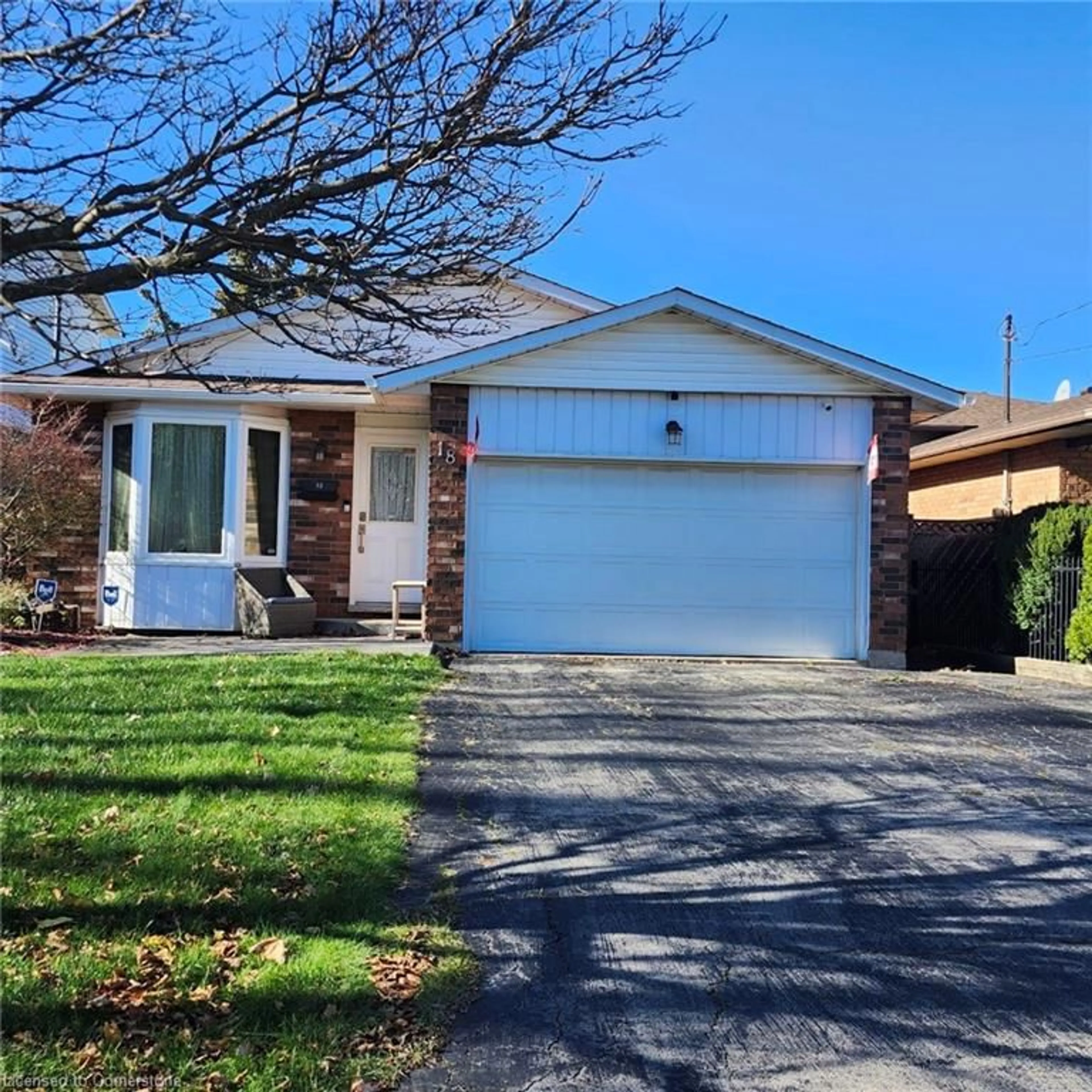 Frontside or backside of a home, the street view for 18 Rosewell St, Hamilton Ontario L8W 2L1