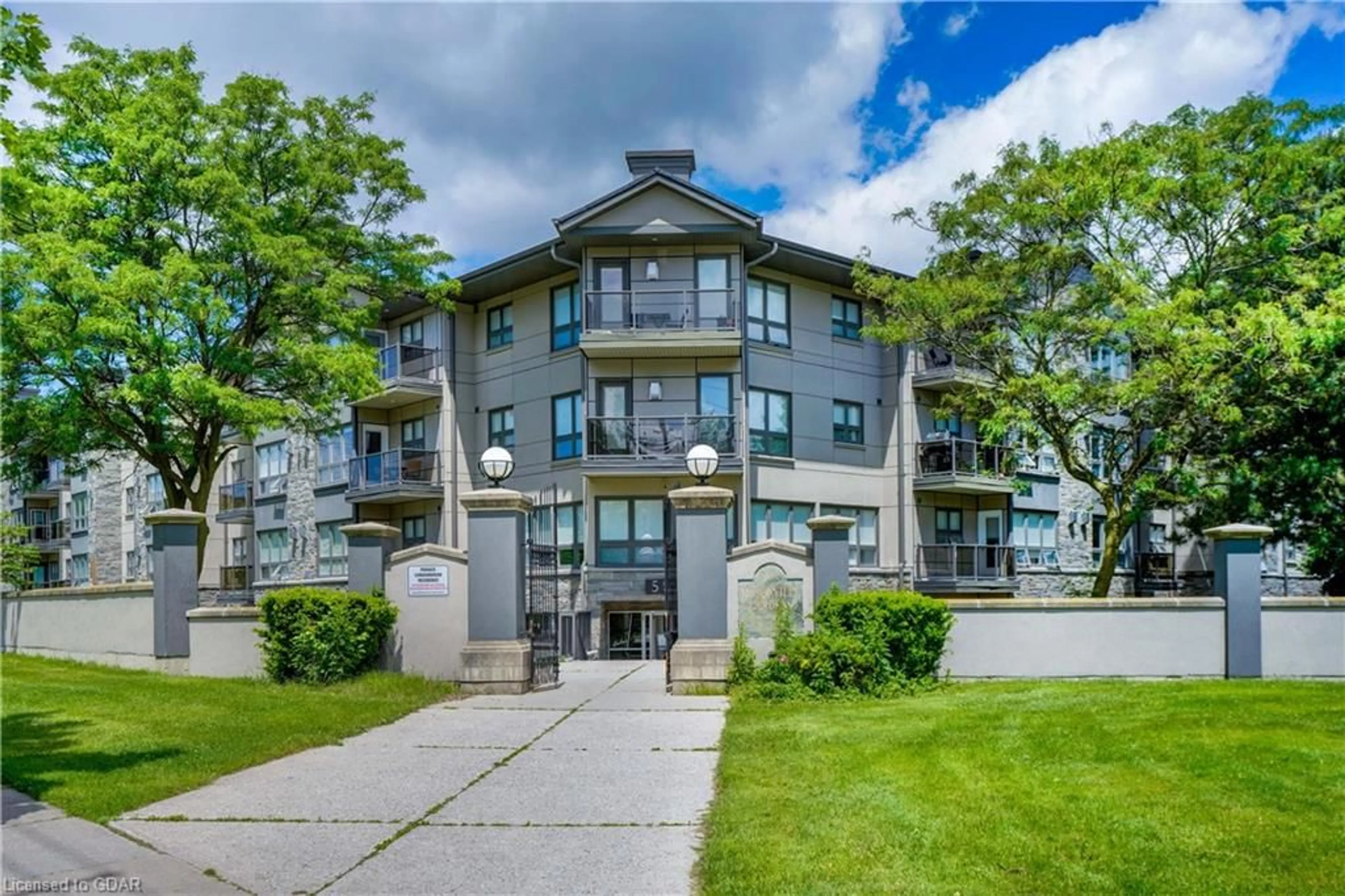 A pic from exterior of the house or condo, the front or back of building for 5 Jacksway Cres #402, London Ontario N5X 3T6