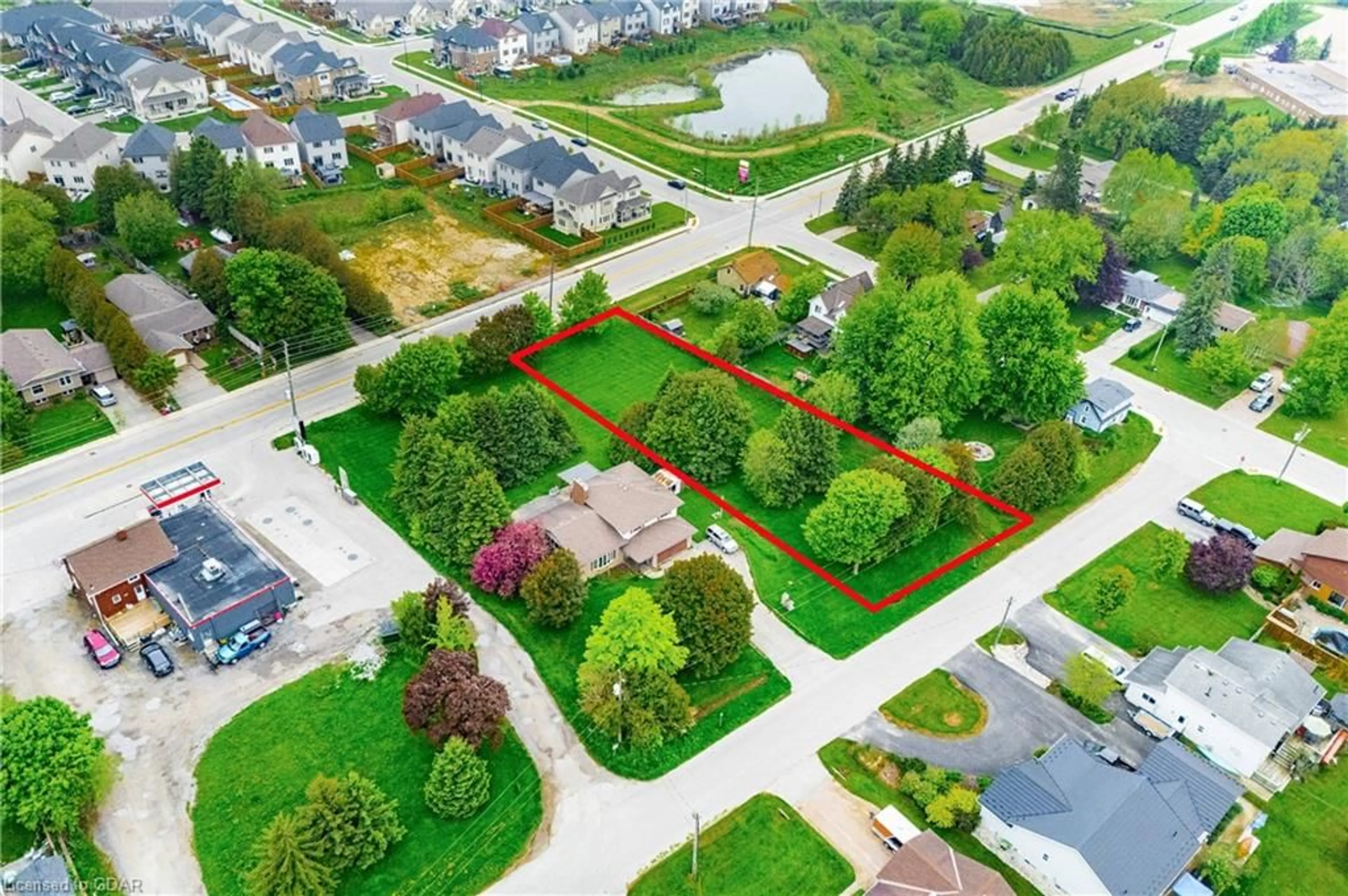 Frontside or backside of a home, the fenced backyard for 575A Hill St, Fergus Ontario N1M 2X9