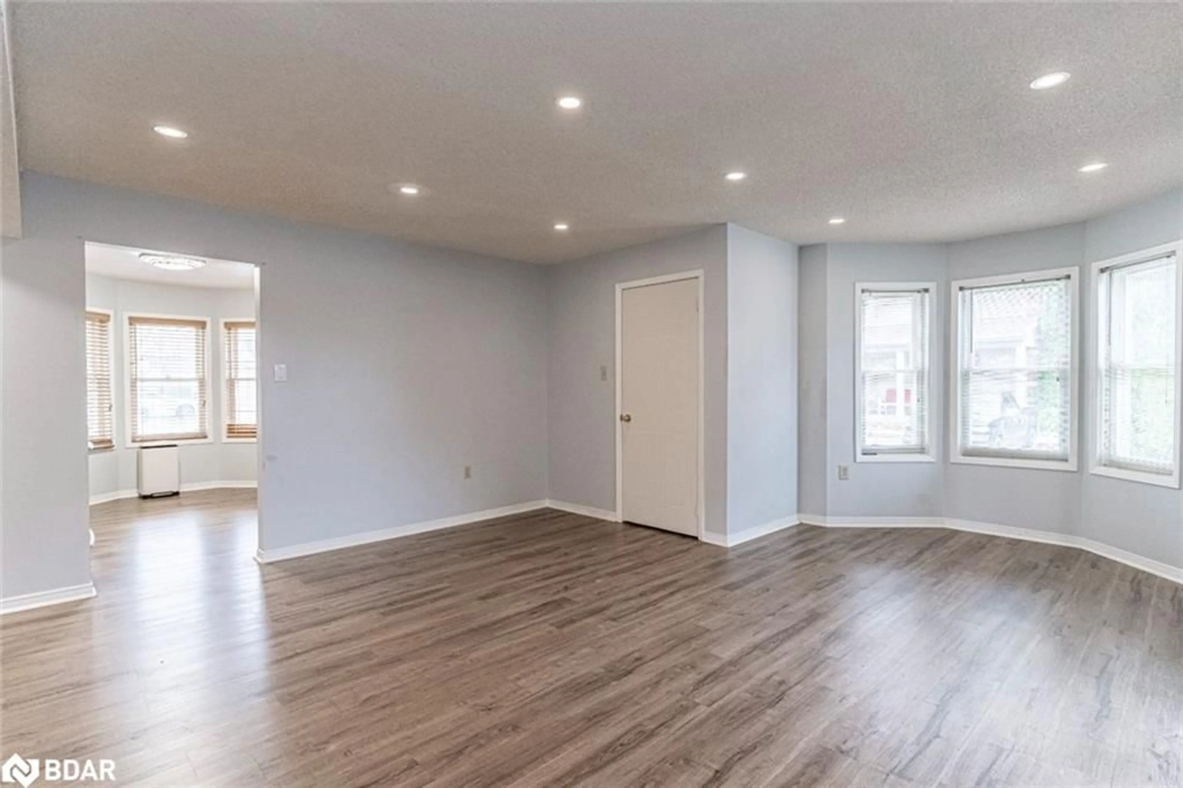 A pic of a room, wood floors for 119 D'ambrosio Dr #35, Barrie Ontario L4N 7R7