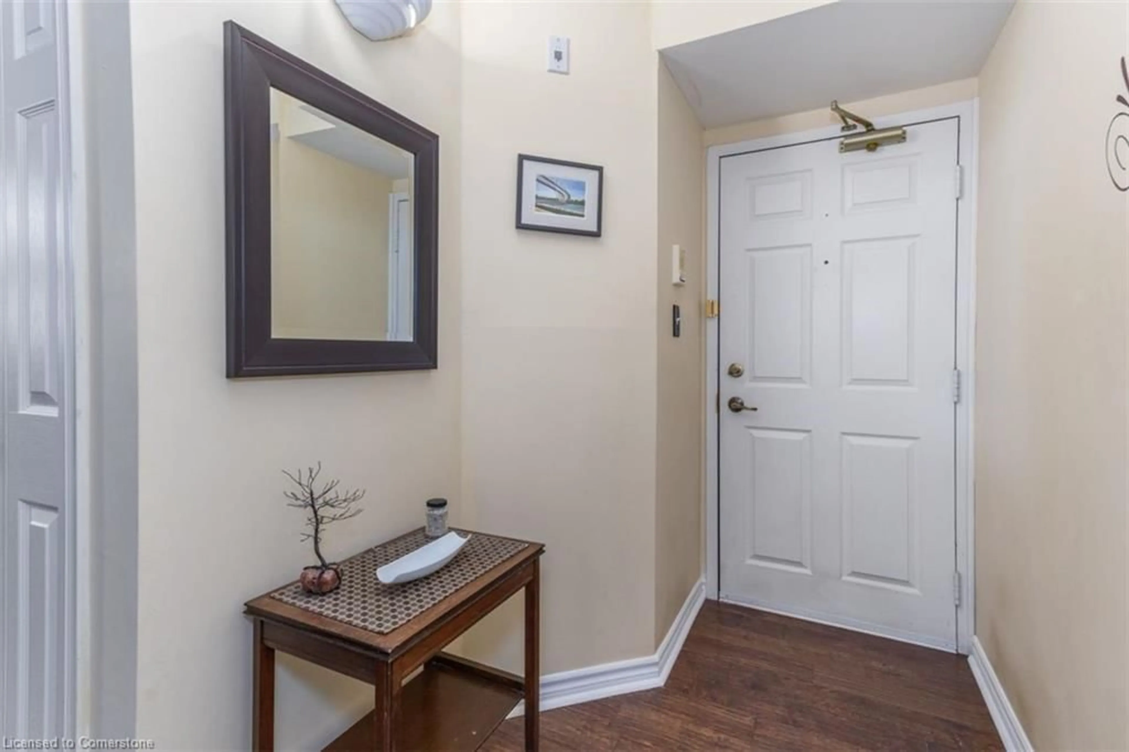 Indoor entryway, wood floors for 1411 Walker's Line #216, Burlington Ontario L7M 4P5