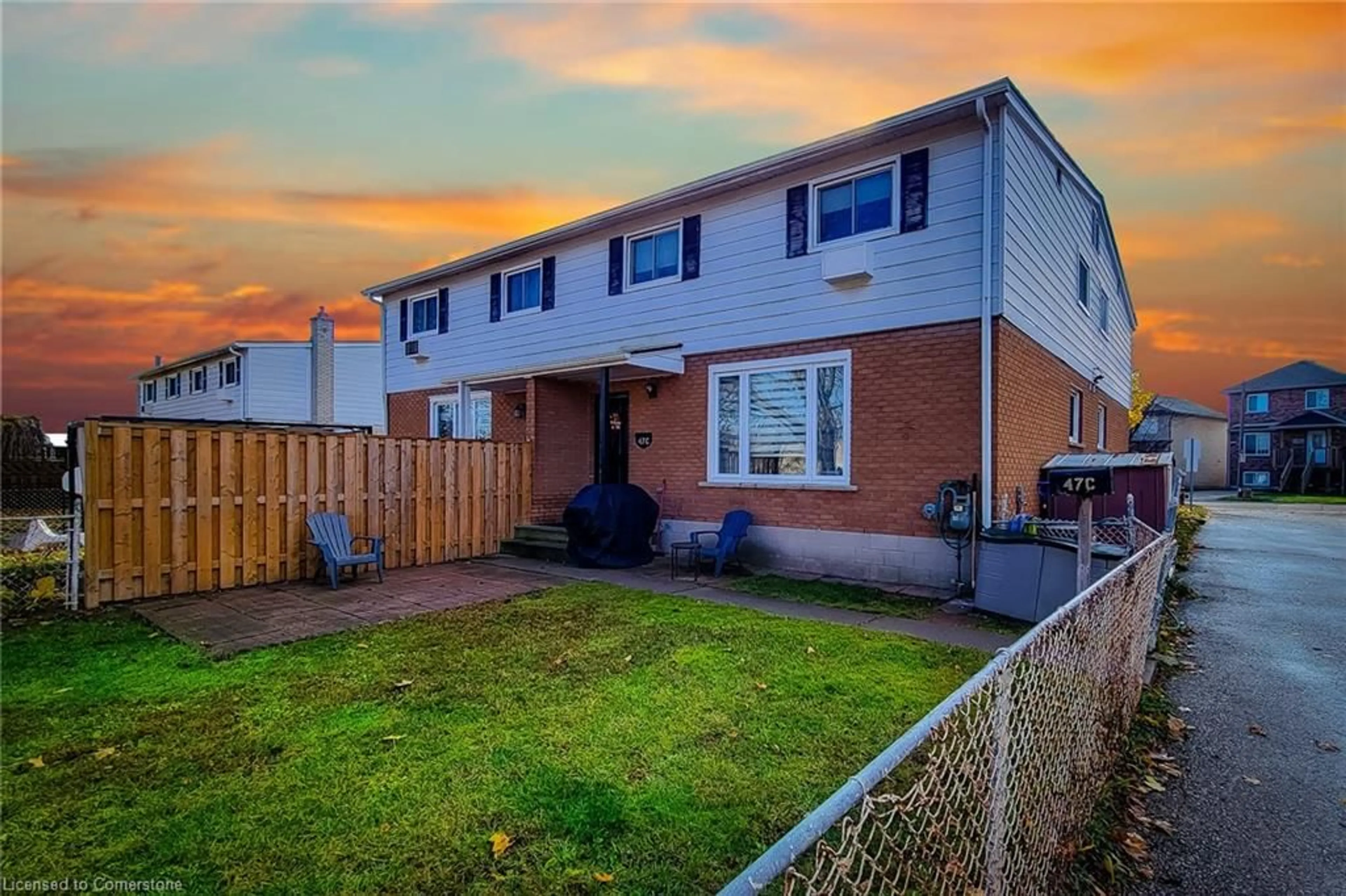 A pic from exterior of the house or condo, the fenced backyard for 47 Metcalfe Cres #C, Brantford Ontario N3R 2L7