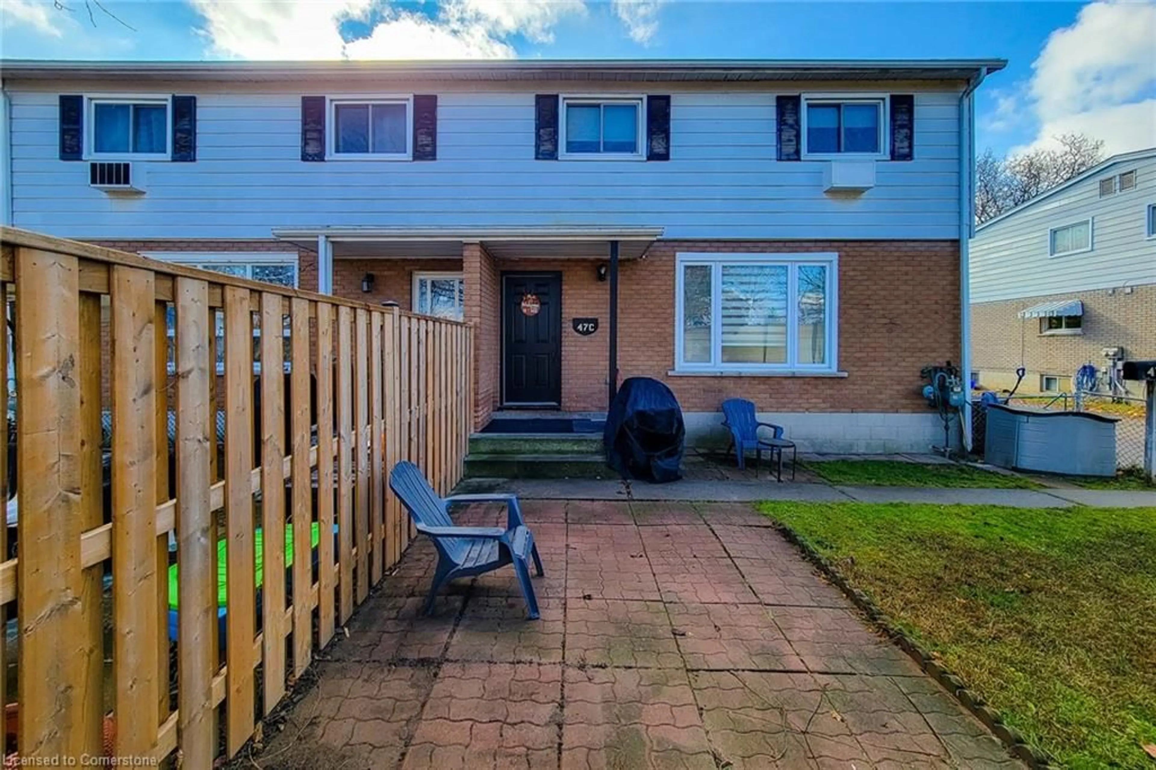 A pic from exterior of the house or condo, the fenced backyard for 47 Metcalfe Cres #C, Brantford Ontario N3R 2L7