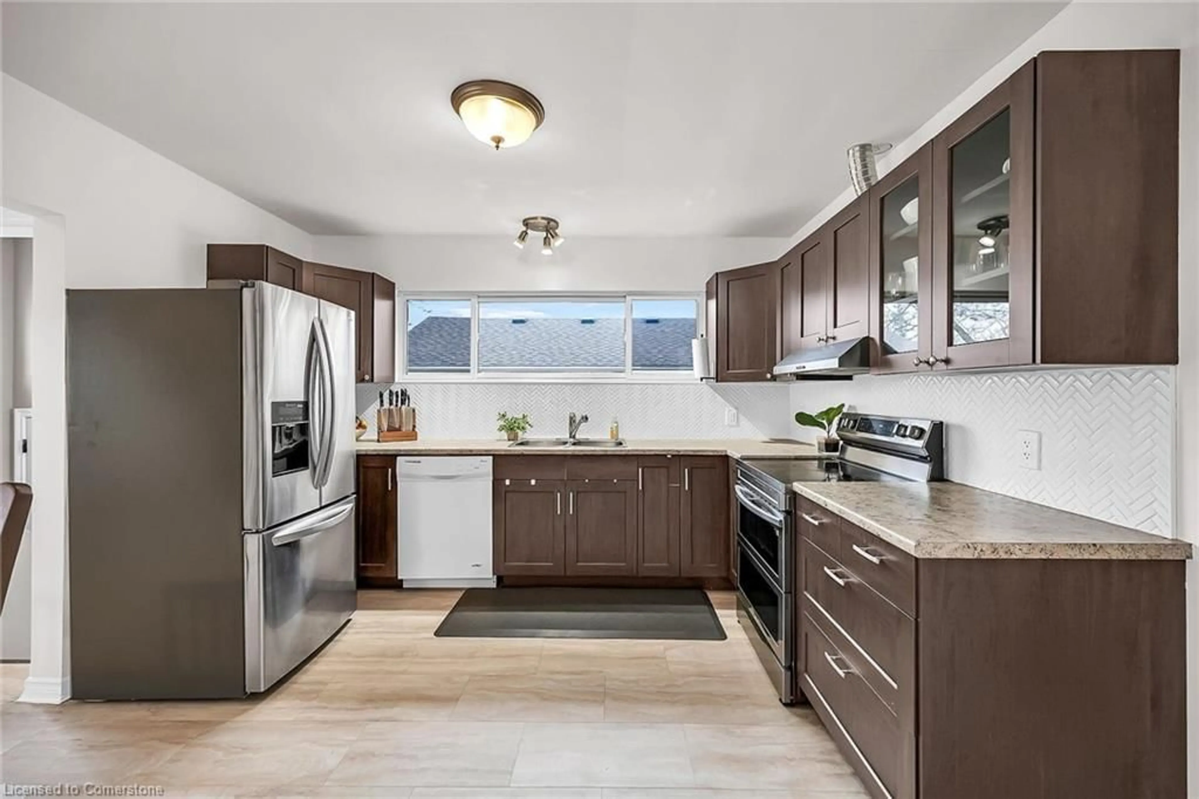 Open concept kitchen for 787 Upper Ottawa St, Hamilton Ontario L8T 3T8