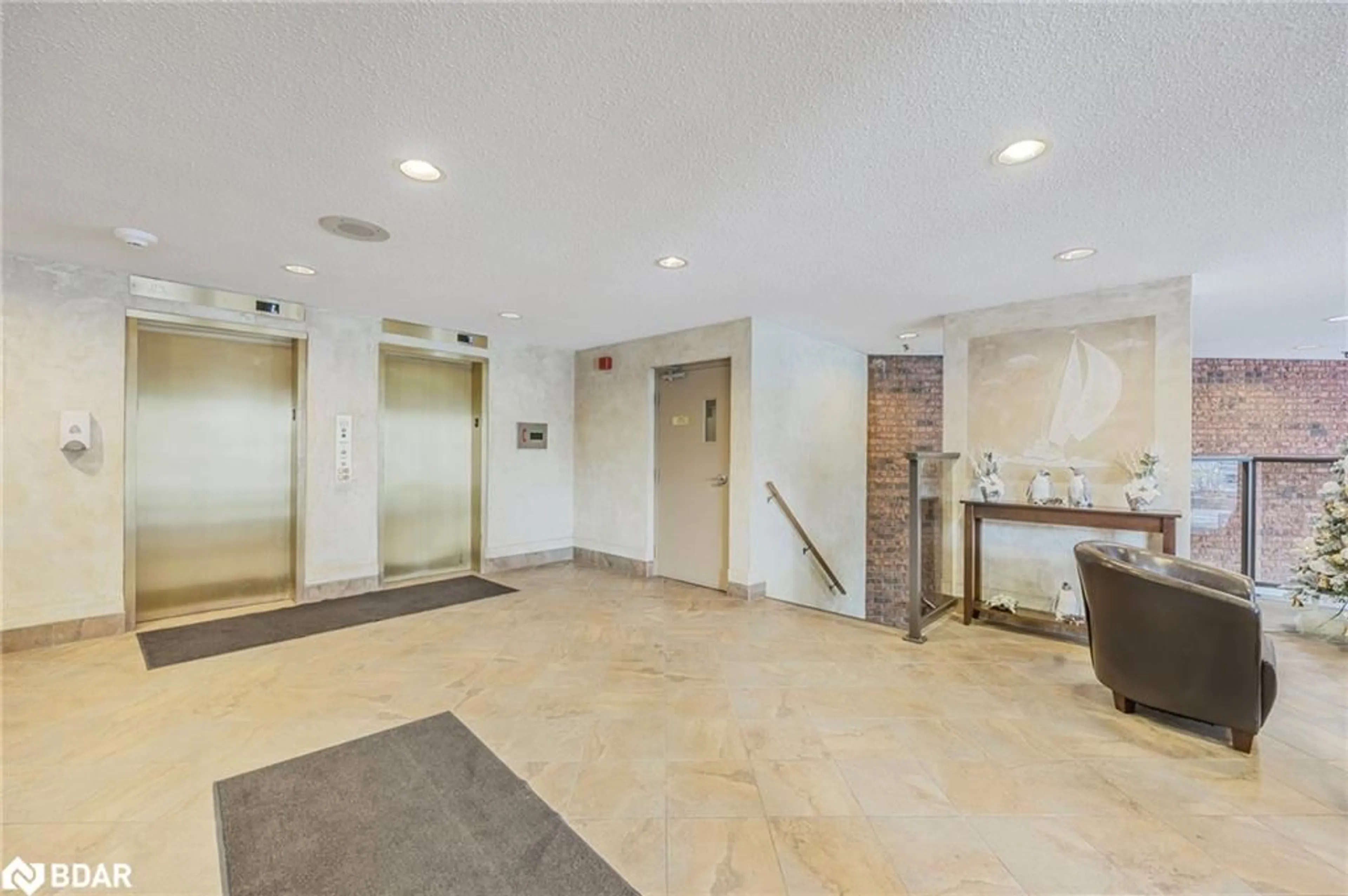 Indoor foyer, not visible floor for 181 Collier St #104, Barrie Ontario L4M 5L6