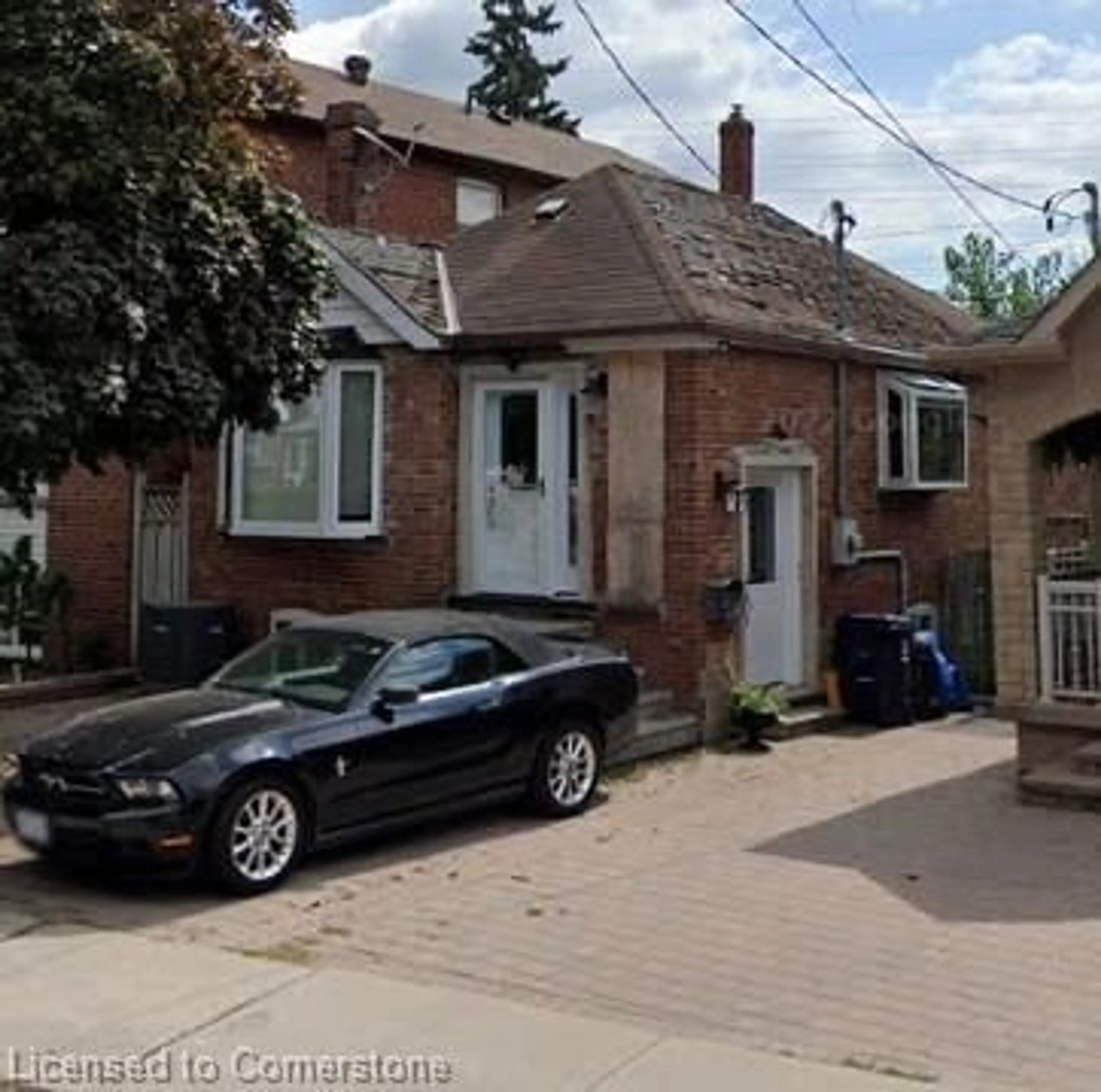 Frontside or backside of a home, the street view for 25 Foxwell St, Toronto Ontario M6N 1Y9