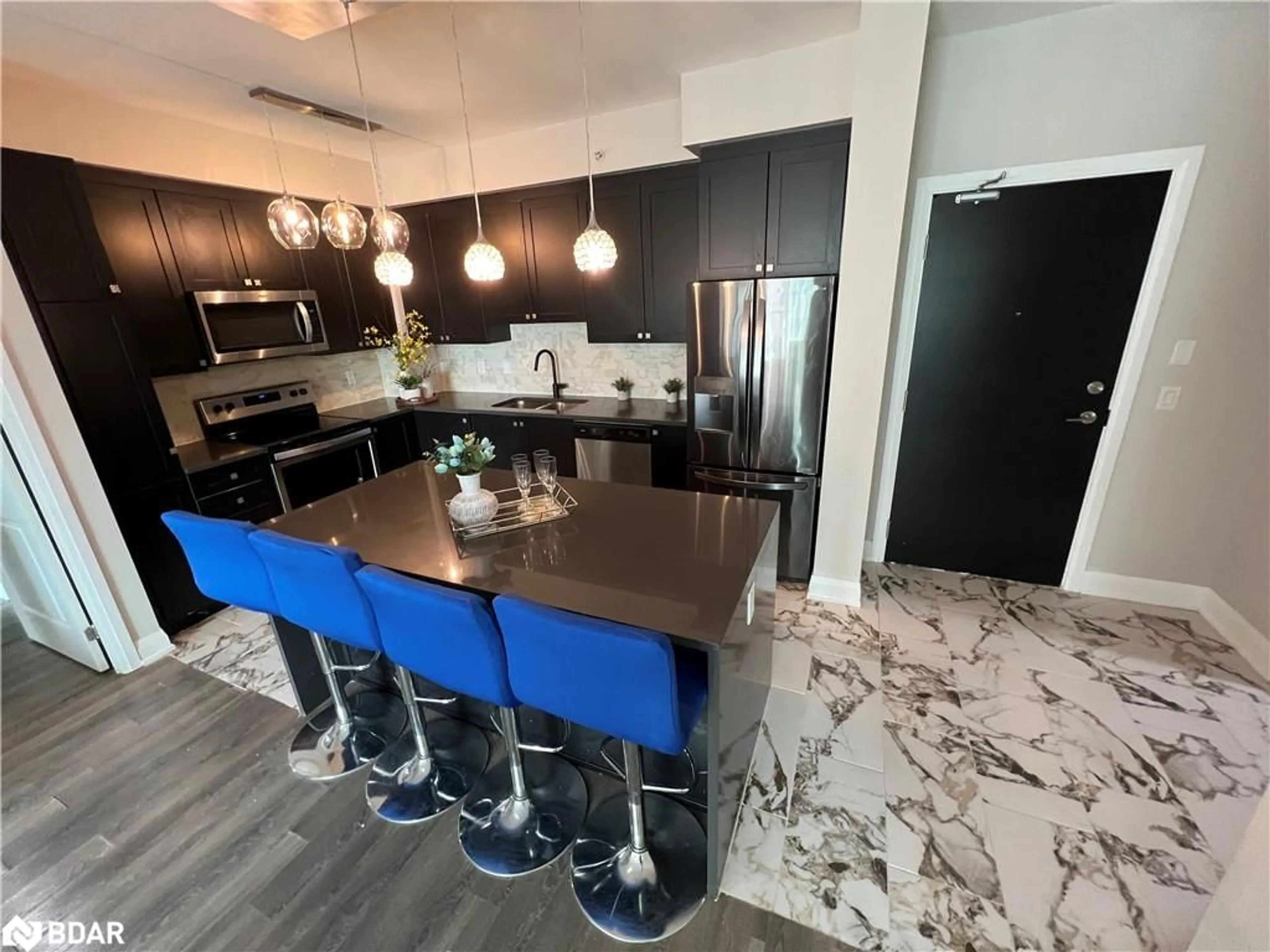 Open concept kitchen for 65 Yorkland Blvd #206, Brampton Ontario L6P 4M5