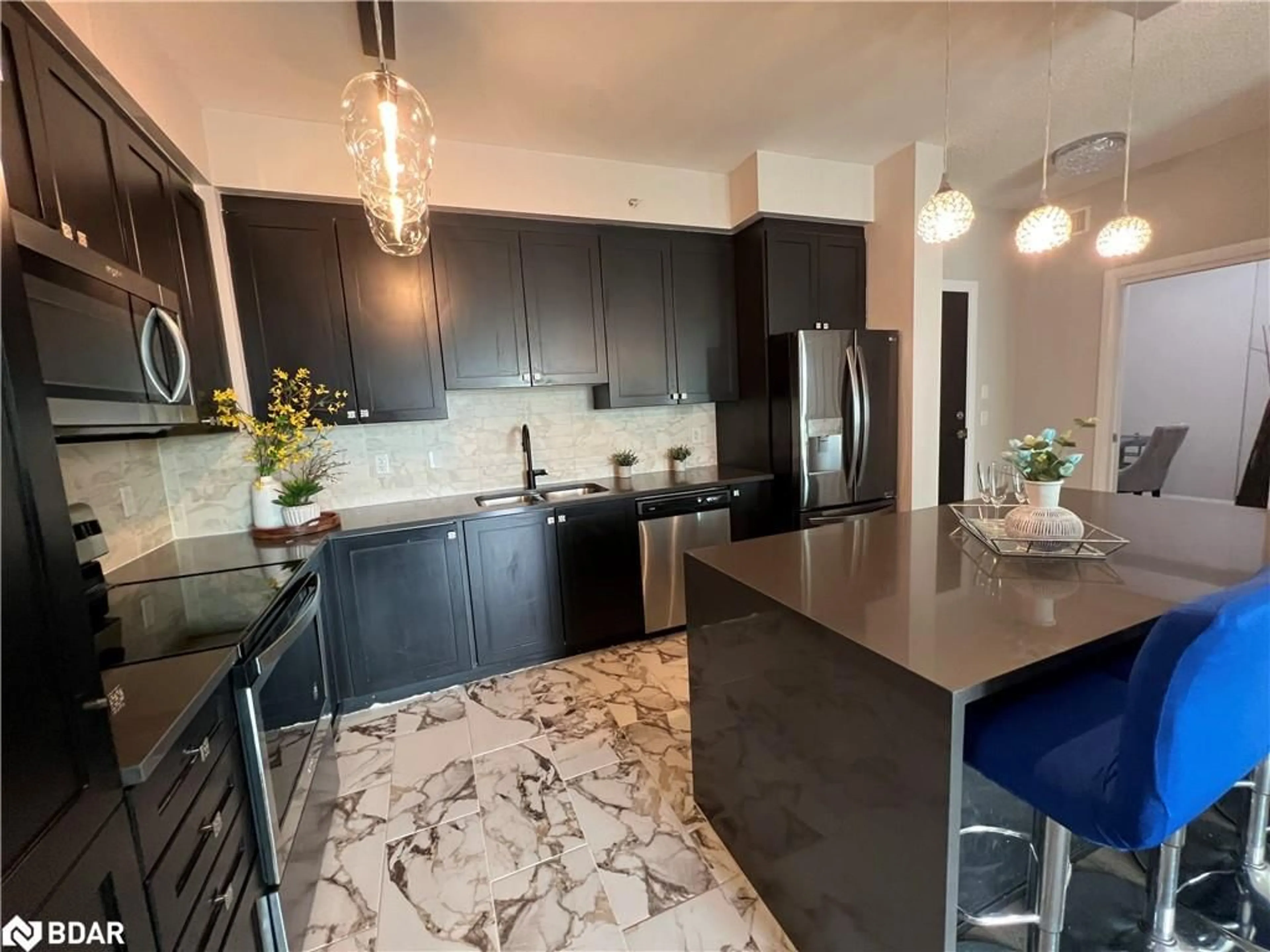 Contemporary kitchen, ceramic floors for 65 Yorkland Blvd #206, Brampton Ontario L6P 4M5