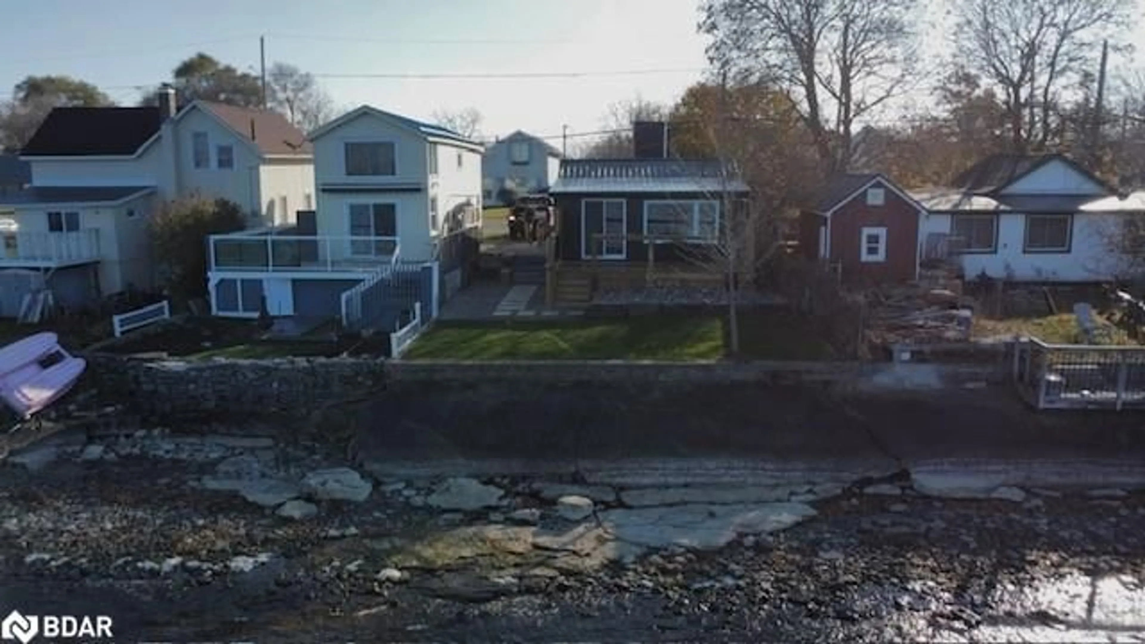 Frontside or backside of a home, the street view for 80 Ridley St, Prince Edward County Ontario K8N 4Z1