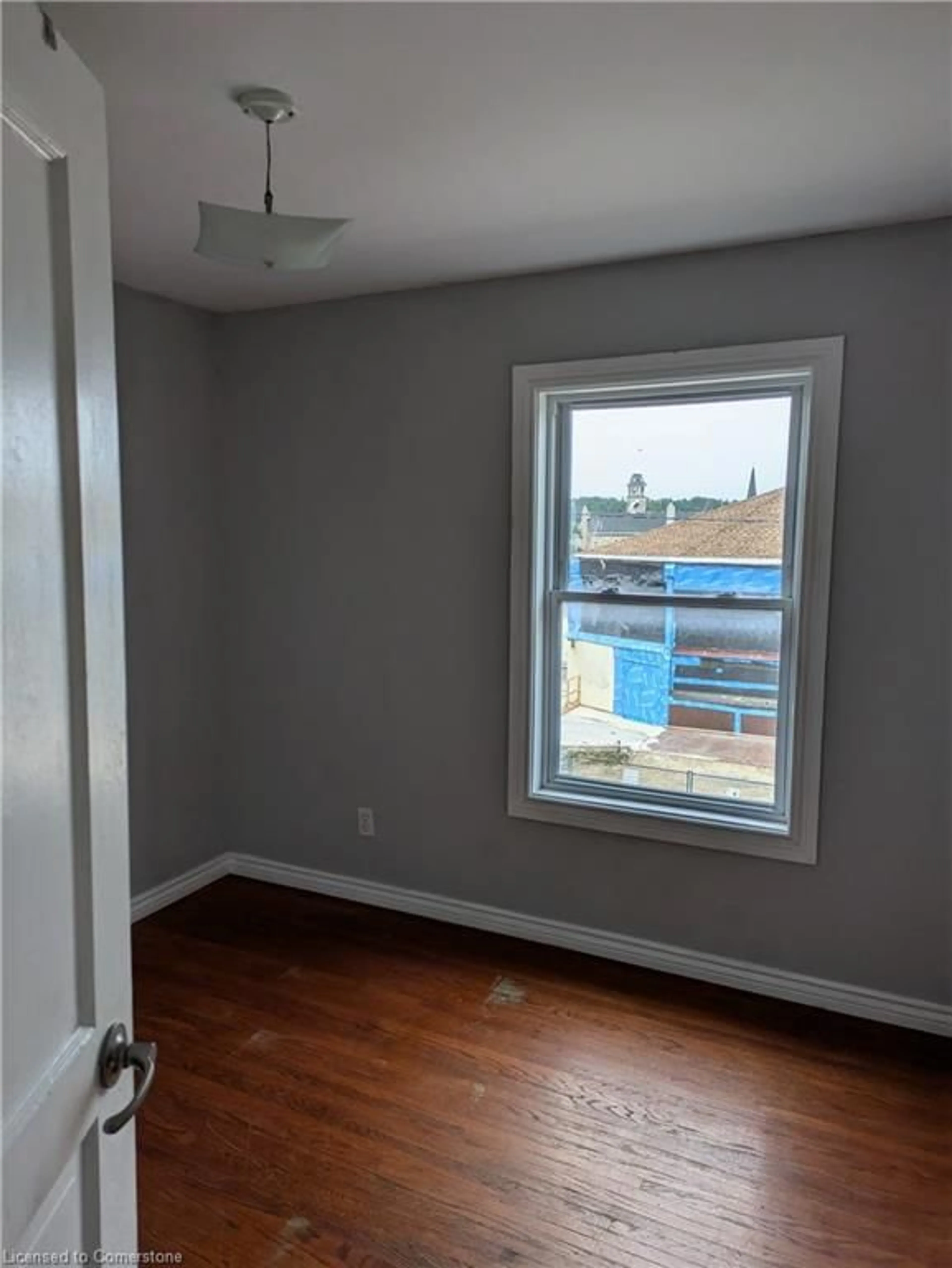 A pic of a room, wood floors for 15 Shade St, Cambridge Ontario N1R 4J6