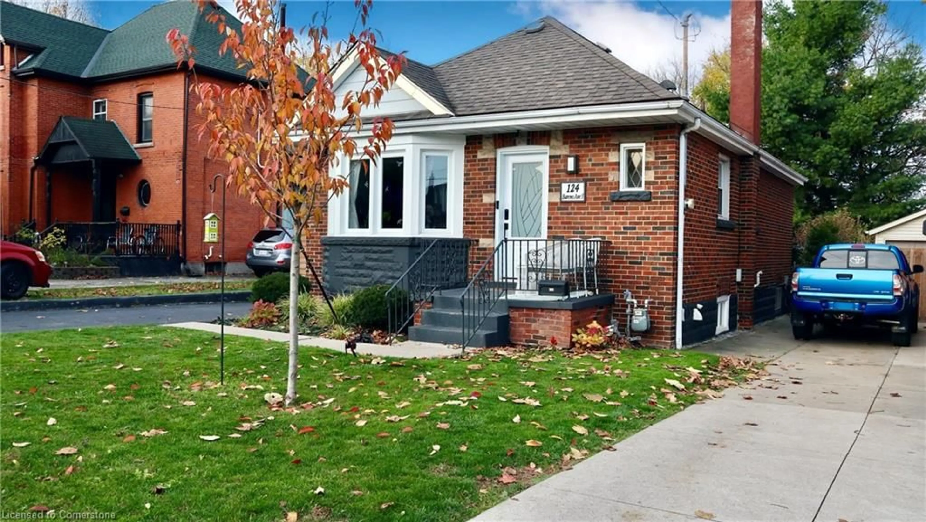 Home with brick exterior material for 124 Barons Ave, Hamilton Ontario L8K 2Y7