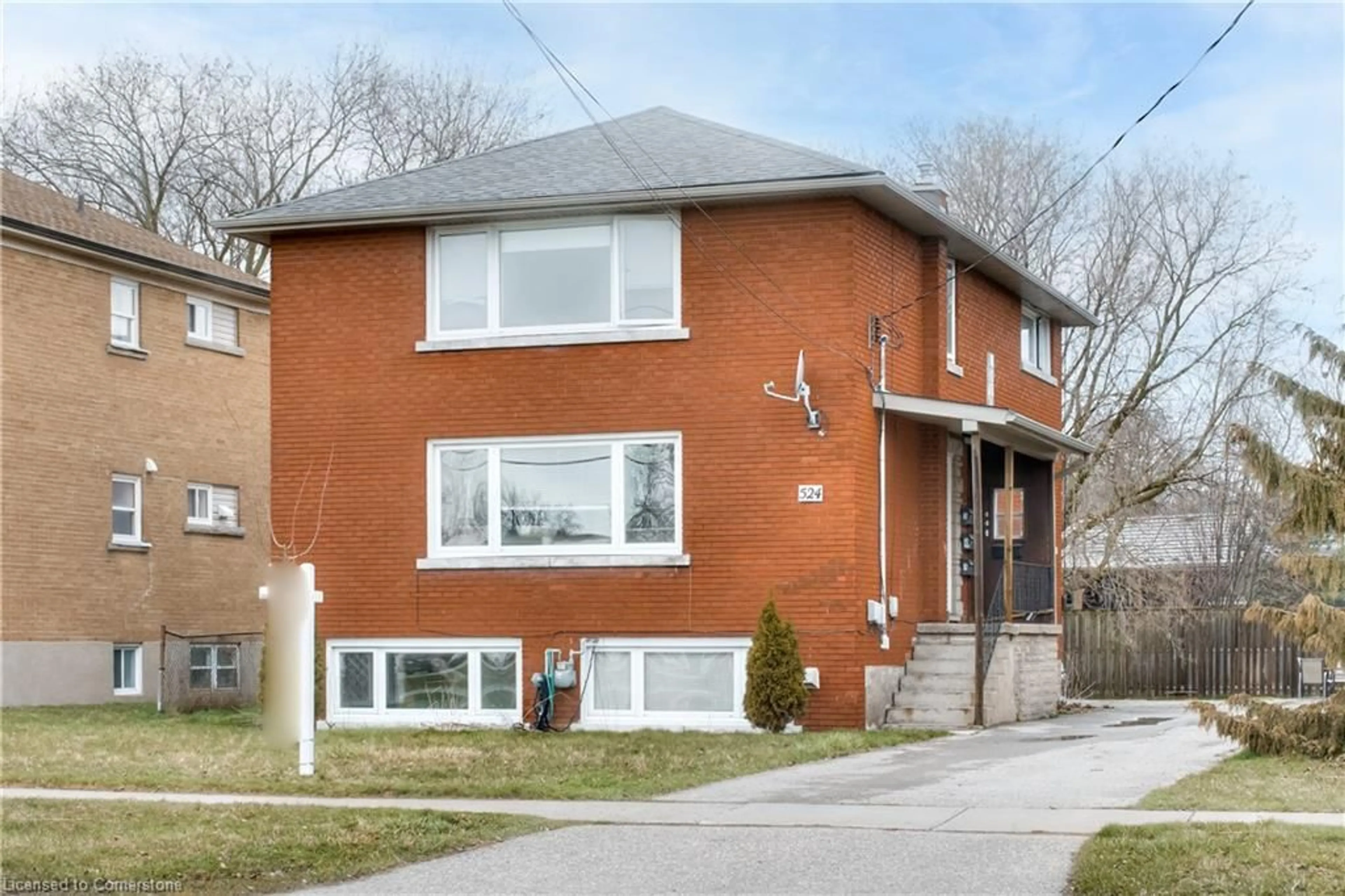 Frontside or backside of a home, the front or back of building for 524 Krug St, Kitchener Ontario N2B 1L6