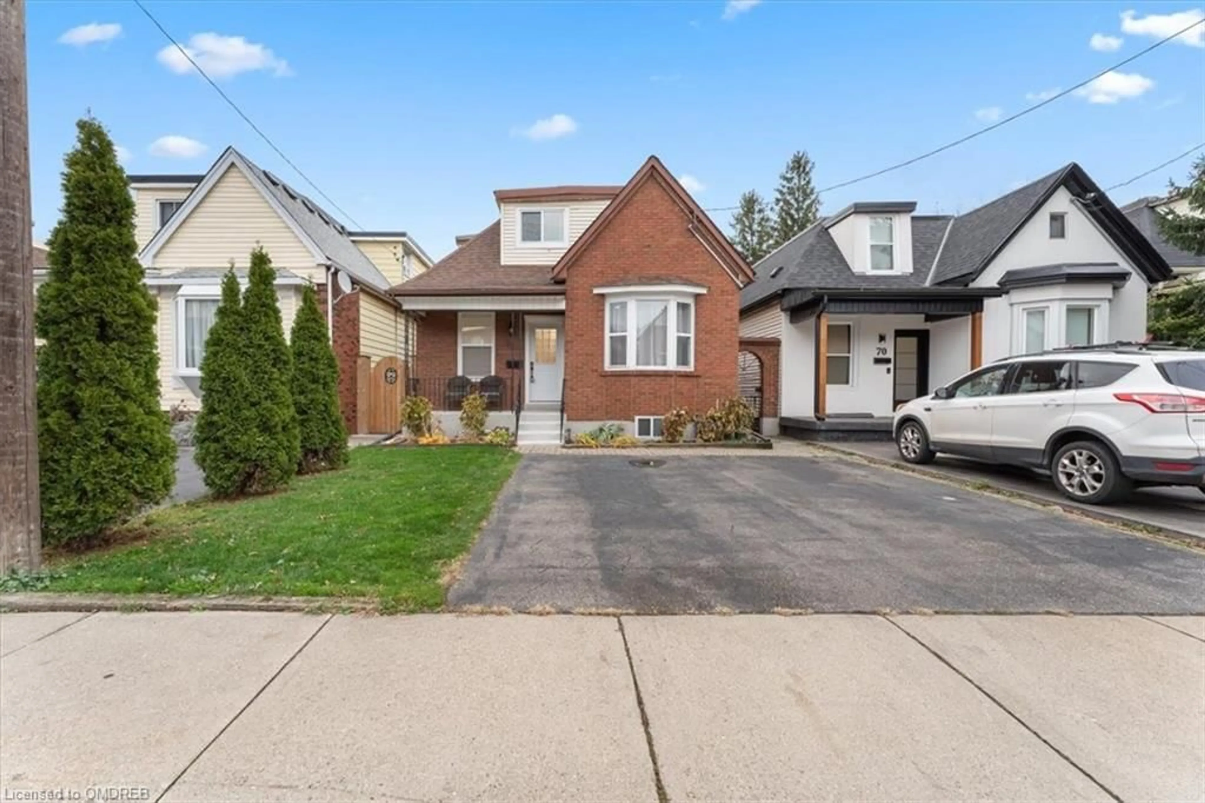 Frontside or backside of a home, the street view for 72 Leeming St, Hamilton Ontario L8L 5T3