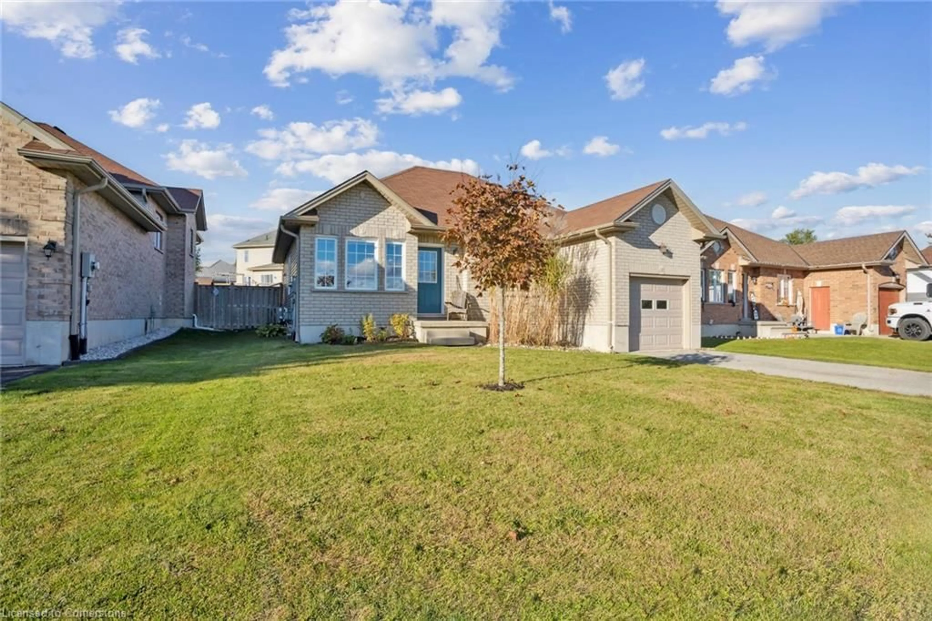 Frontside or backside of a home, the fenced backyard for 24 Pollard St, Norwich Ontario N0J 1P0