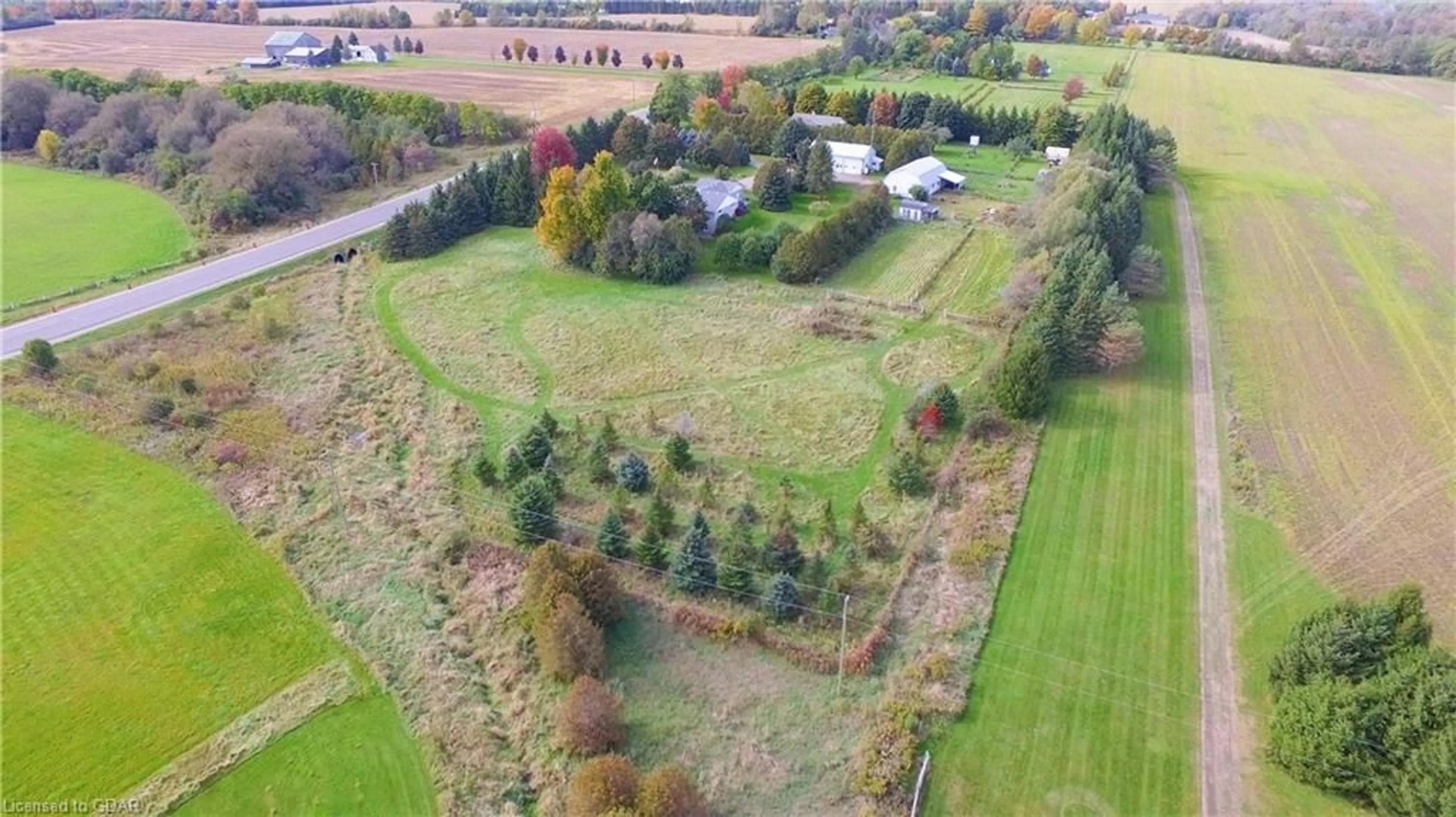 A pic from exterior of the house or condo, the fenced backyard for 5819 Wellington Cty Rd 7, Guelph Ontario N1H 6J2