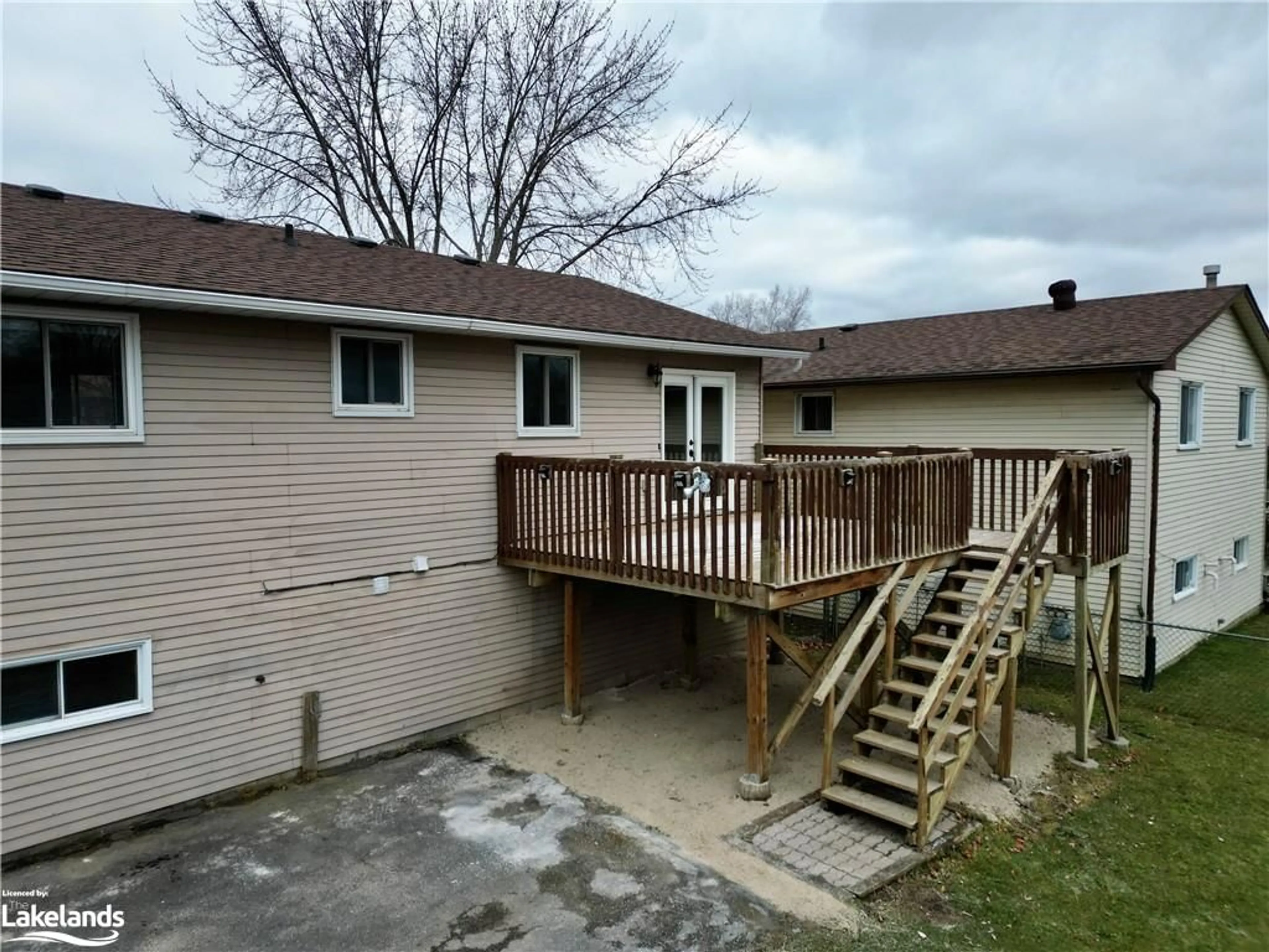 Frontside or backside of a home, the fenced backyard for 14 Korlea Cres, Orillia Ontario L3V 7K3