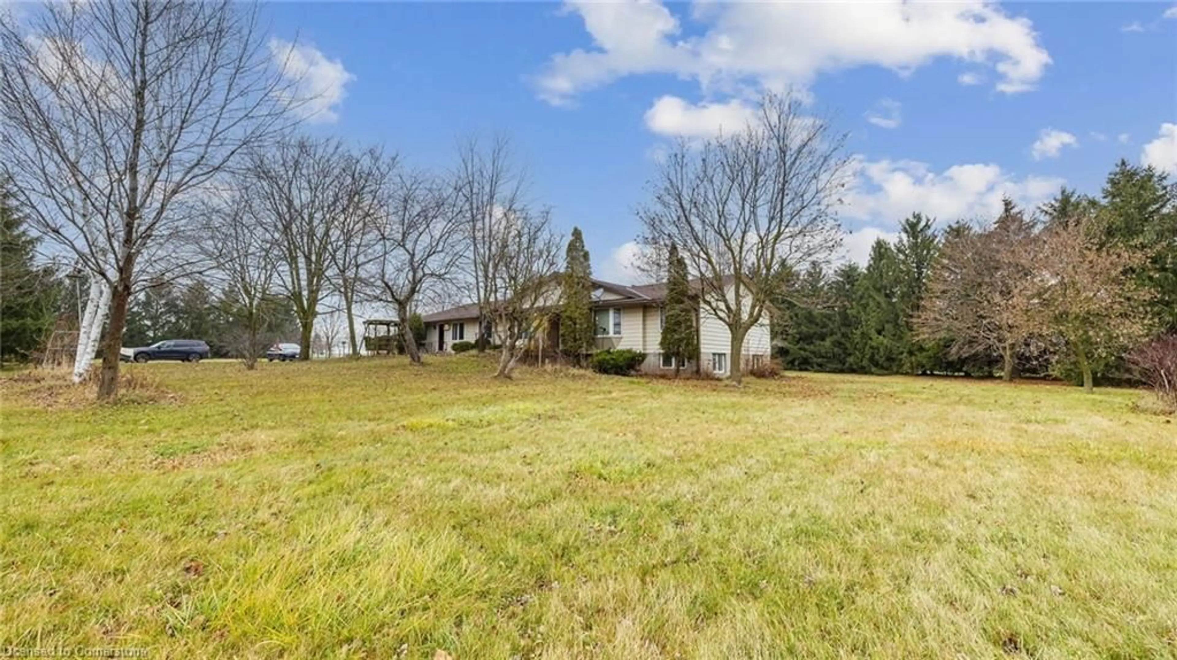 Frontside or backside of a home, the fenced backyard for 6369 Wellington Road 9, Mapleton Ontario N4W 3G8