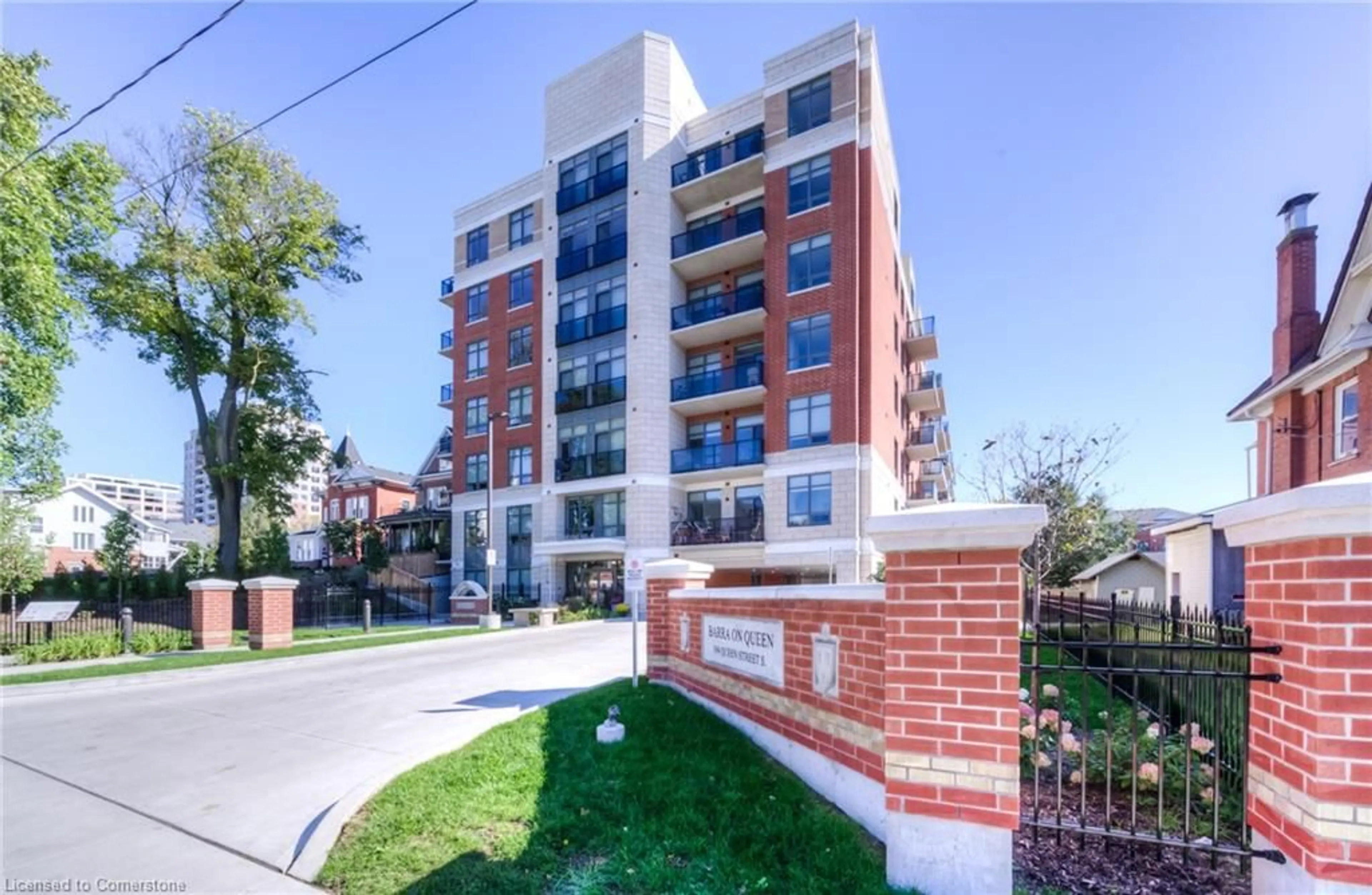 A pic from exterior of the house or condo, the street view for 399 Queen St #202, Kitchener Ontario N2G 0C4