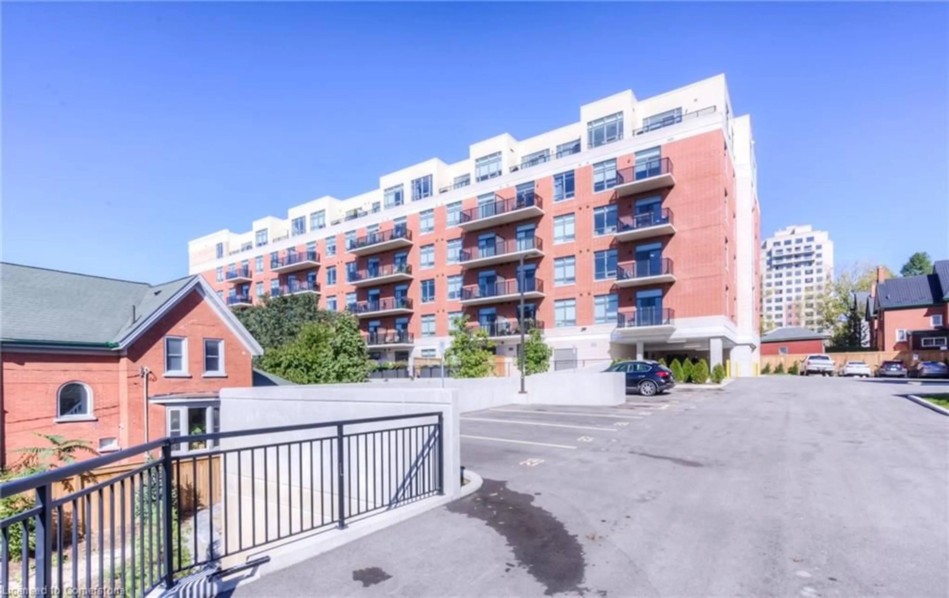 A pic from exterior of the house or condo, the front or back of building for 399 Queen St #202, Kitchener Ontario N2G 0C4