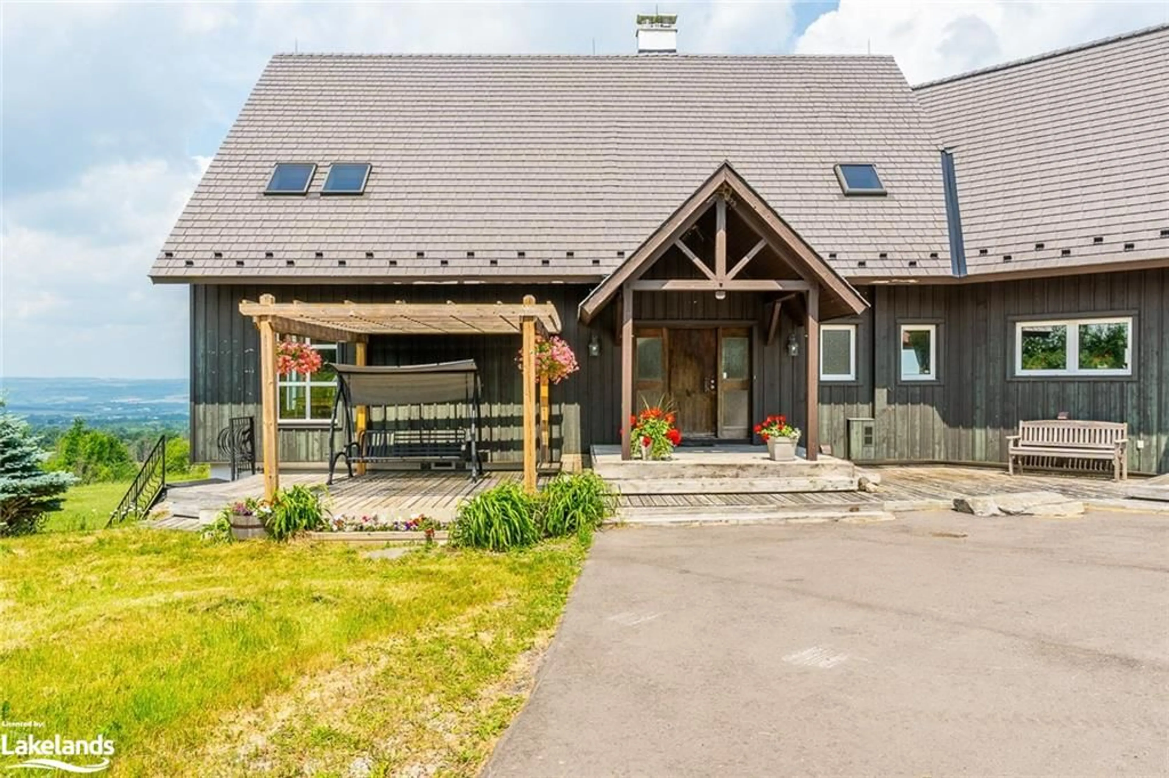 Frontside or backside of a home, cottage for 496083 Grey  2 Rd, The Blue Mountains Ontario N0H 1J0