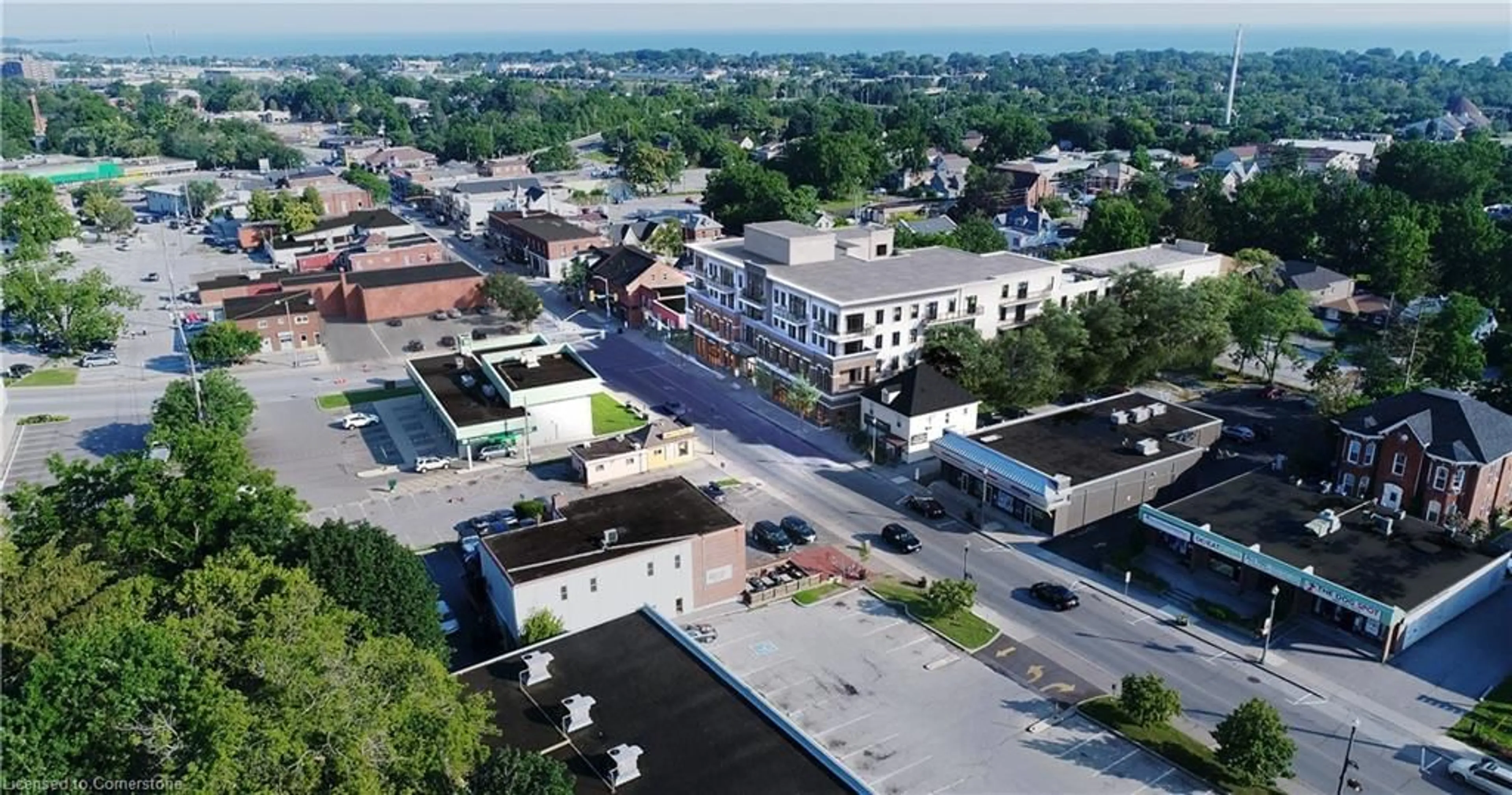 A pic from exterior of the house or condo, the street view for 21 Main St #406, Grimsby Ontario L3M 1M7