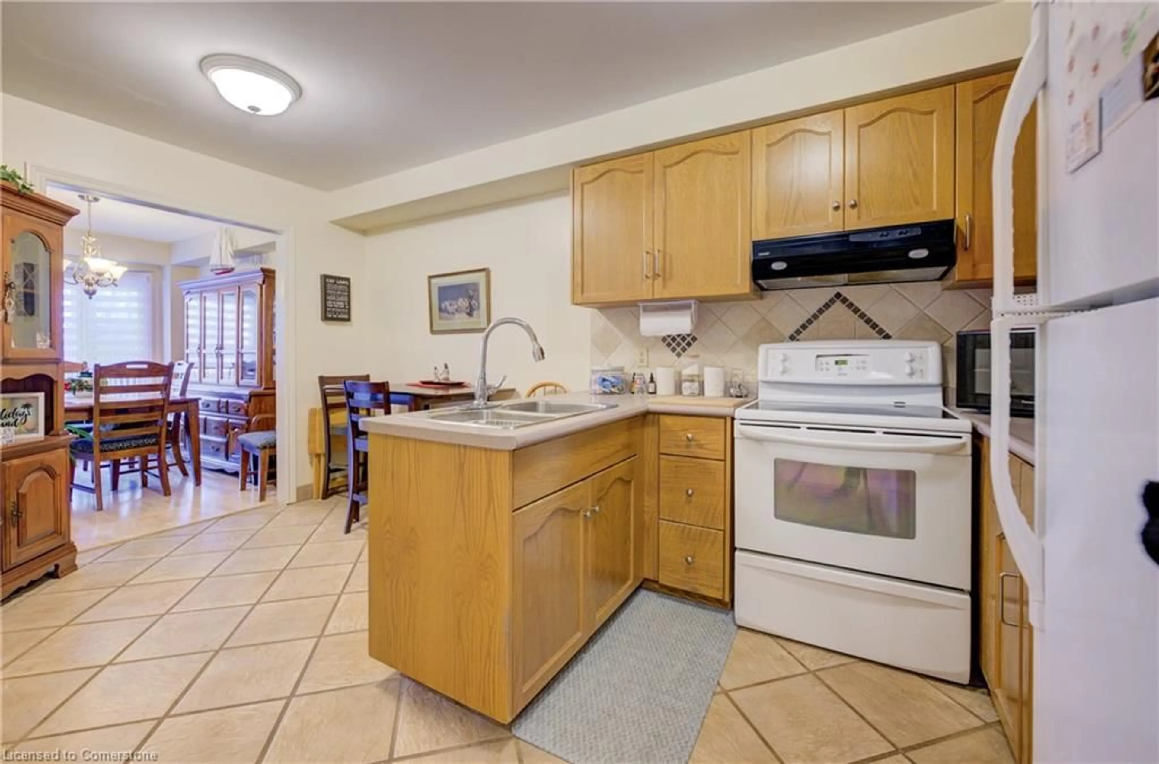 Standard kitchen, wood floors, cottage for 180 Dicenzo Dr, Hamilton Ontario L9B 2K7