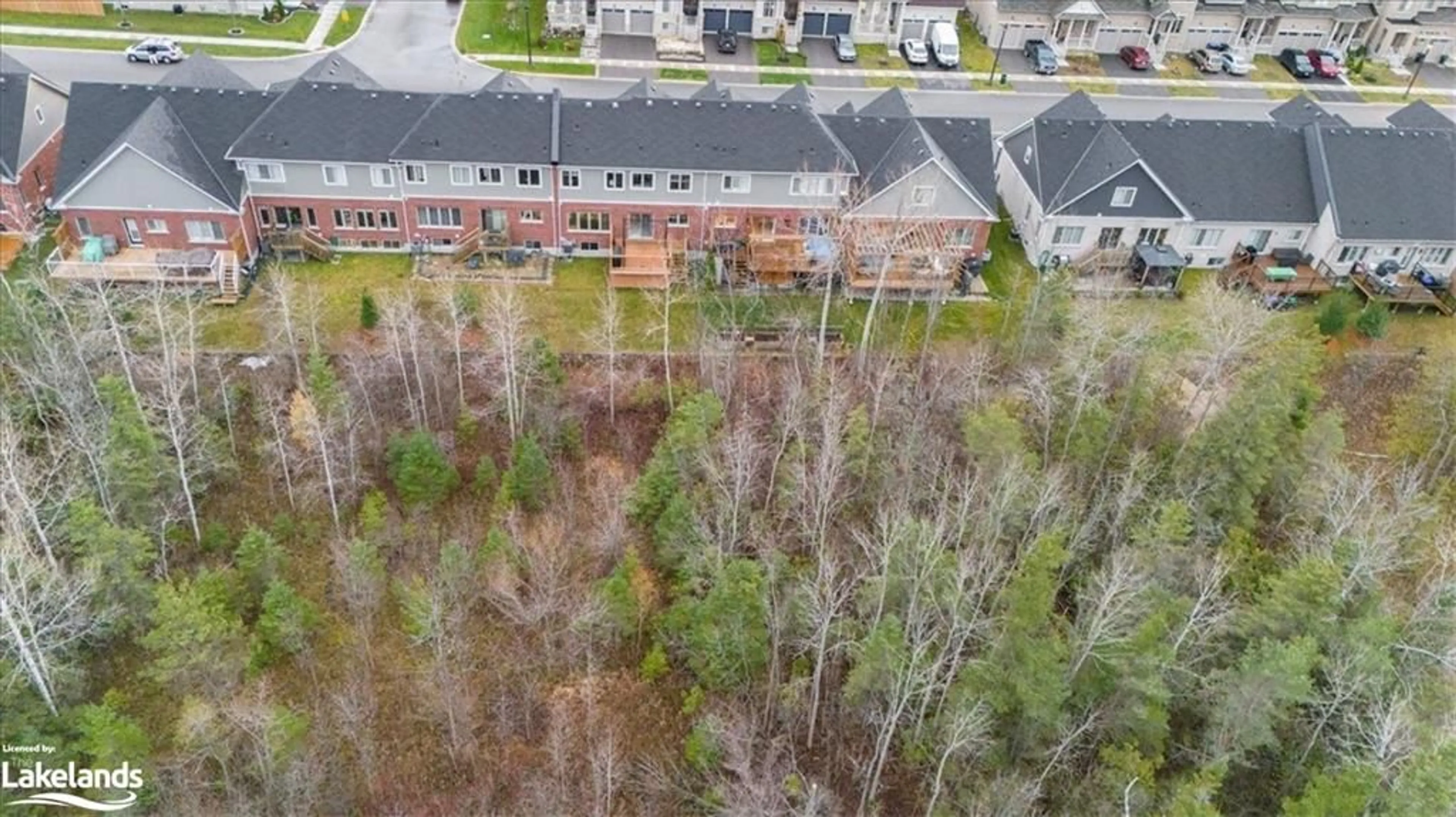 A pic from exterior of the house or condo, the fenced backyard for 141 Allegra Dr, Wasaga Beach Ontario L9Z 0H6