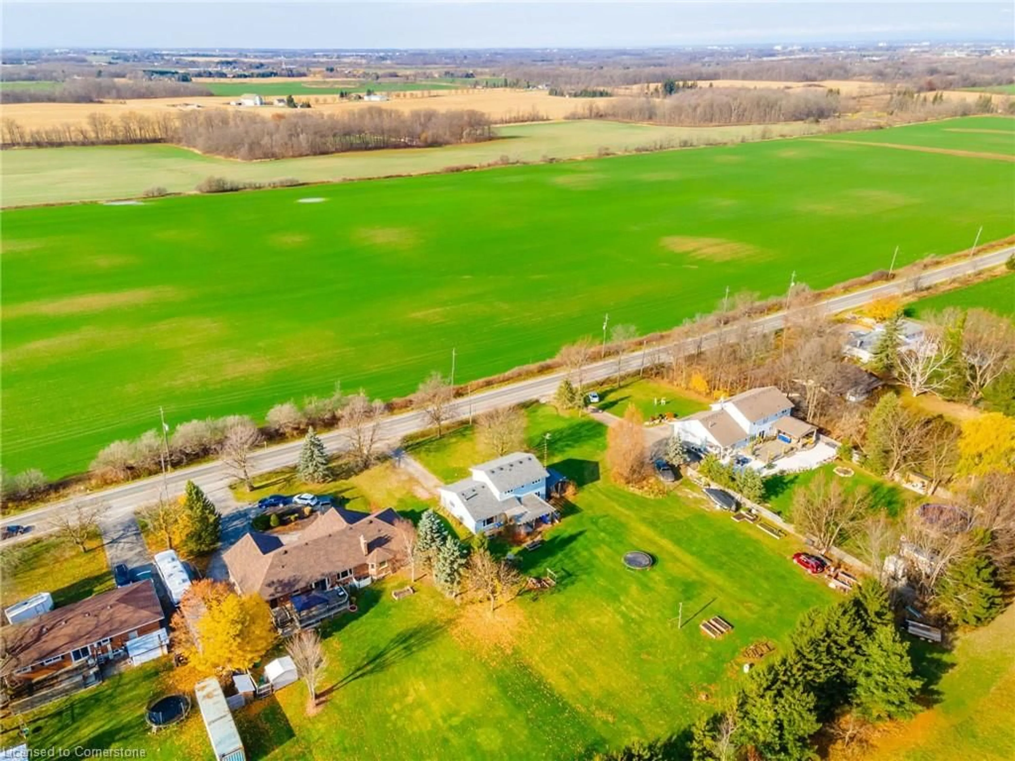 Frontside or backside of a home, the fenced backyard for 2611 Trinity Church Rd, Binbrook Ontario L0R 1C0