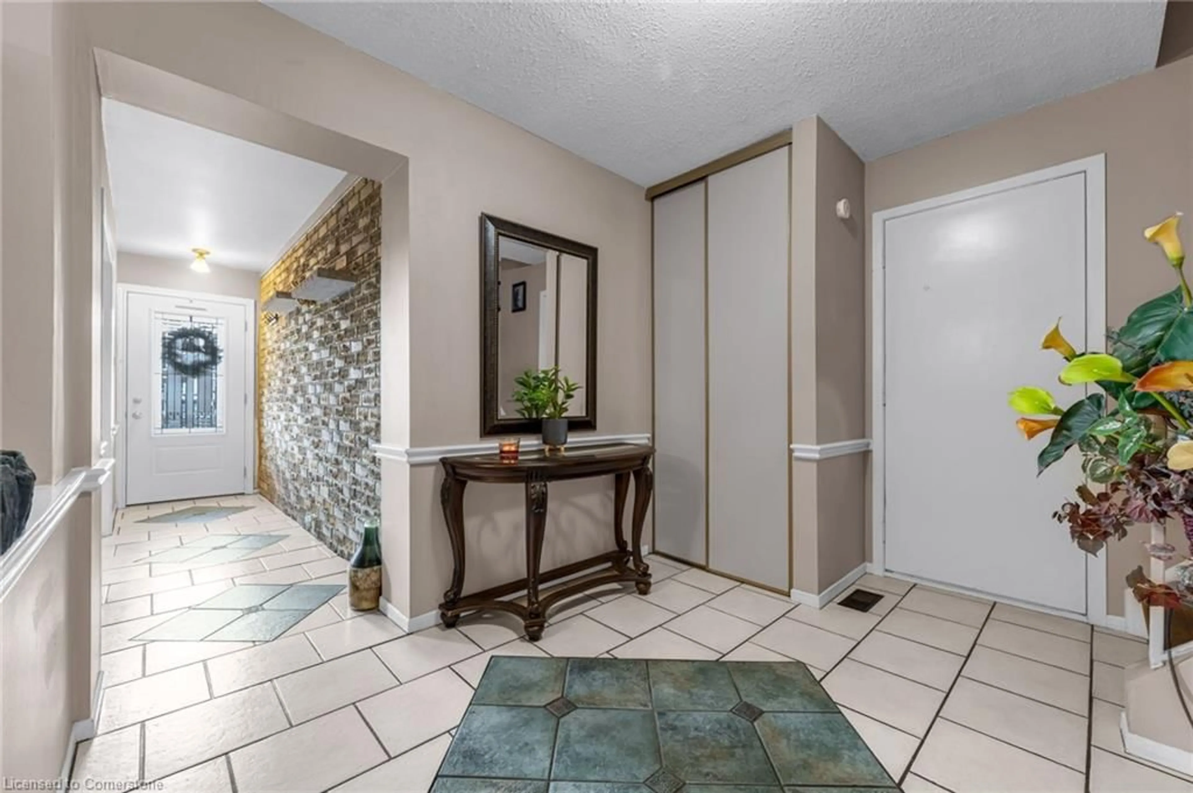 Indoor entryway, ceramic floors for 62 Adis Ave, Hamilton Ontario L9C 6V3