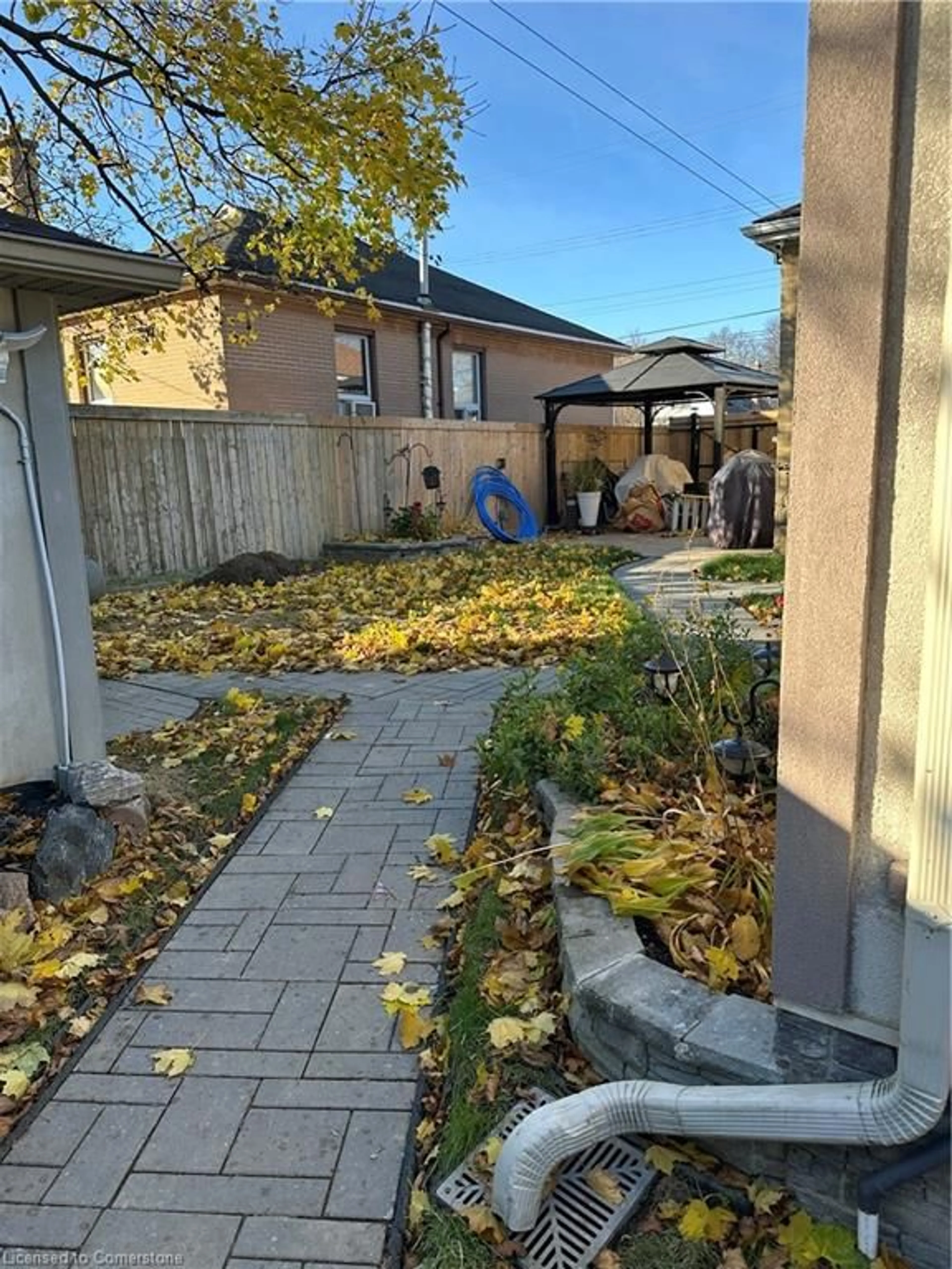 Frontside or backside of a home, the fenced backyard for 627 Upper Sherman Ave, Hamilton Ontario L8V 3M4