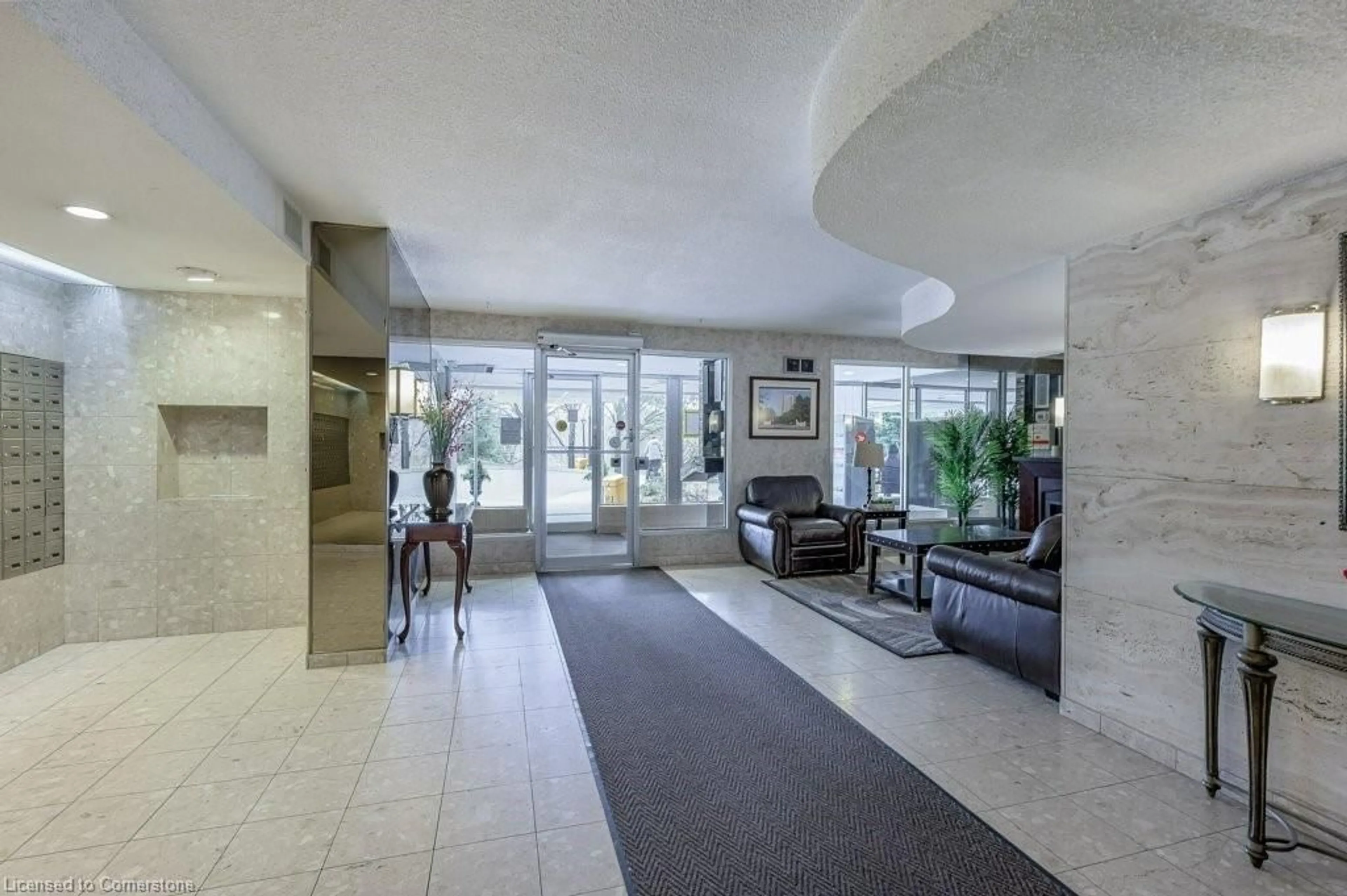 Indoor lobby, cement floor for 3100 Kirwin Ave #2102, Mississauga Ontario L5A 3S6