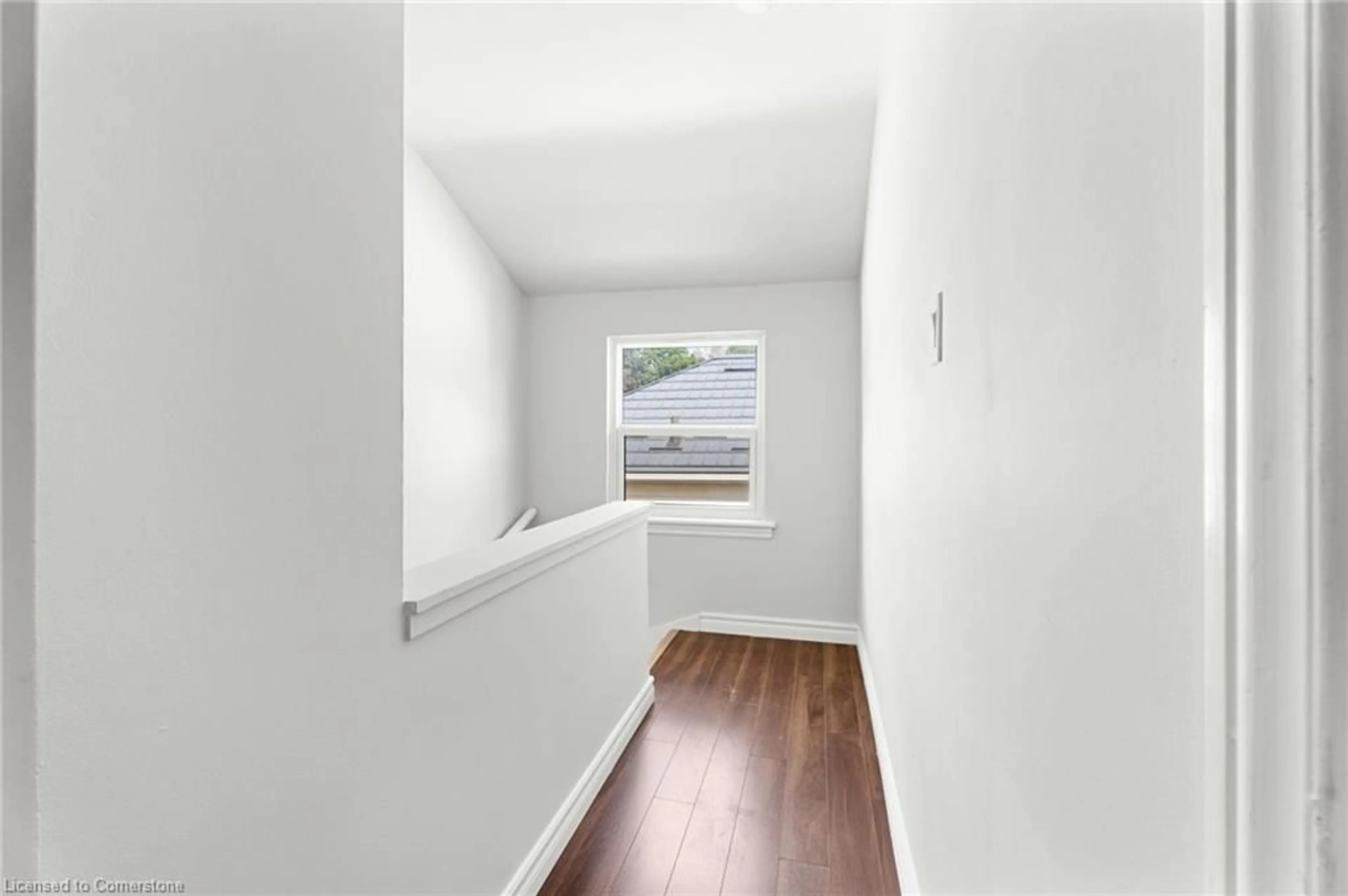 A pic of a room, wood floors for 115 Lancaster St, Kitchener Ontario N2H 4T4