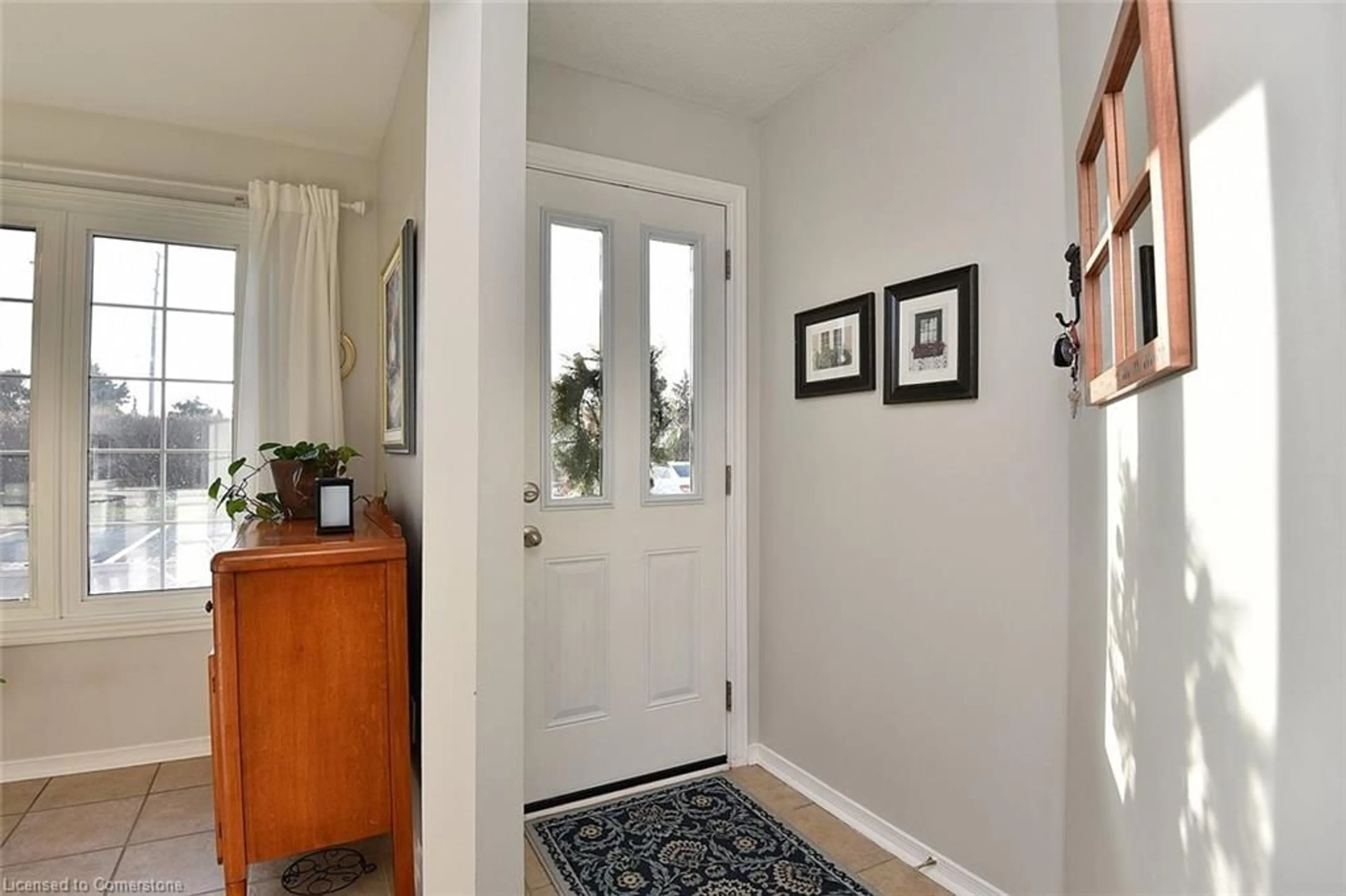 Indoor entryway, wood floors for 2055 Walkers Line #102, Burlington Ontario L7M 4B5