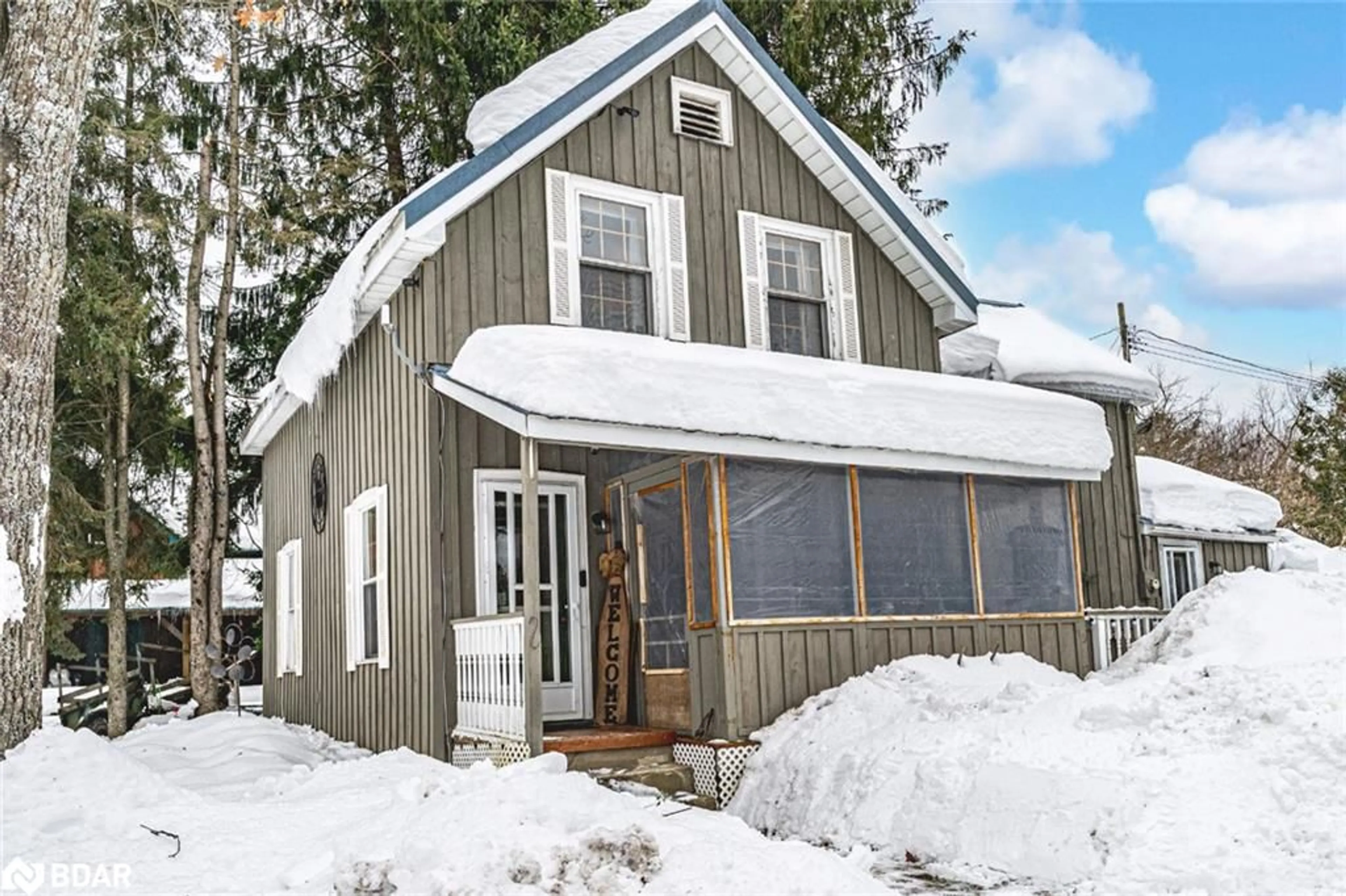 Home with vinyl exterior material, street for 1016 Manson Lane, Gravenhurst Ontario P0E 1N0