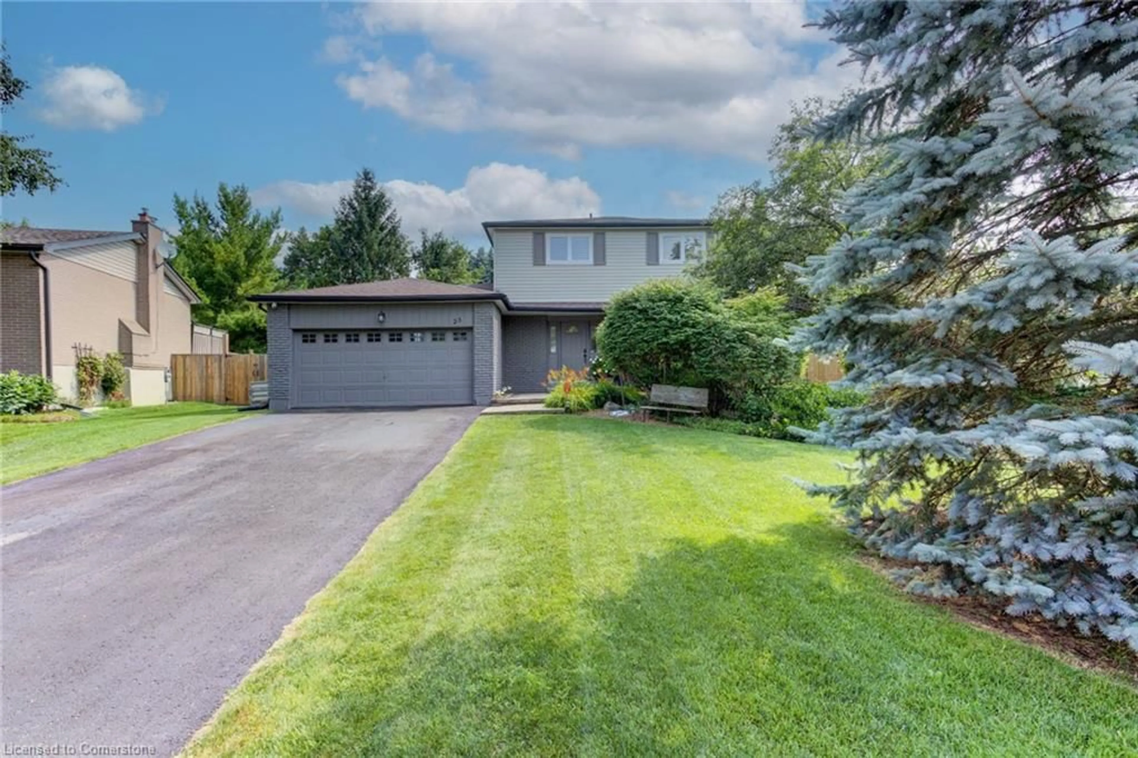 Frontside or backside of a home, the fenced backyard for 25 Tomwell Cres, Erin Ontario N0B 1T0