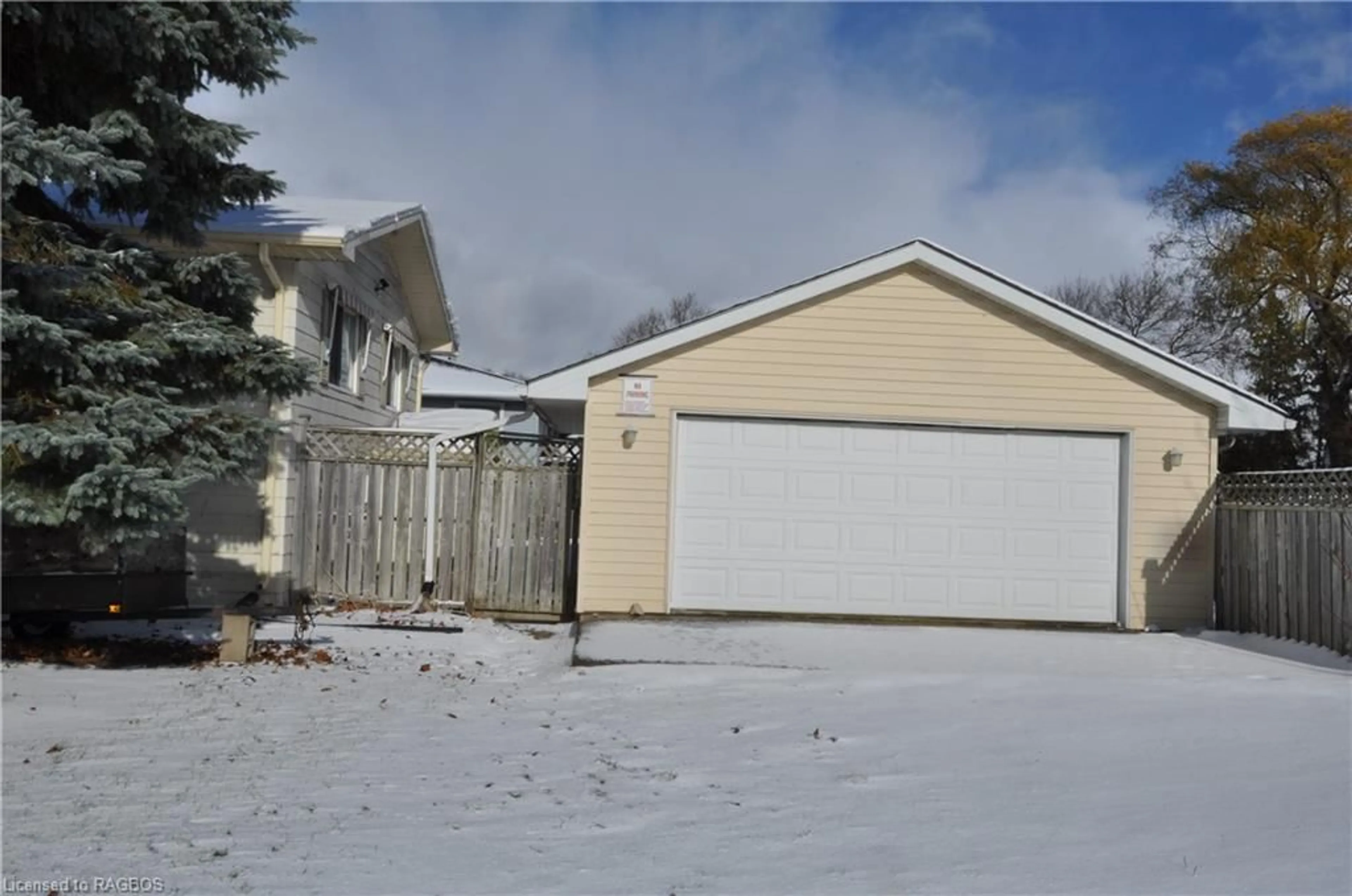 Frontside or backside of a home, the fenced backyard for 1905 8th Ave, Owen Sound Ontario N4K 3C4