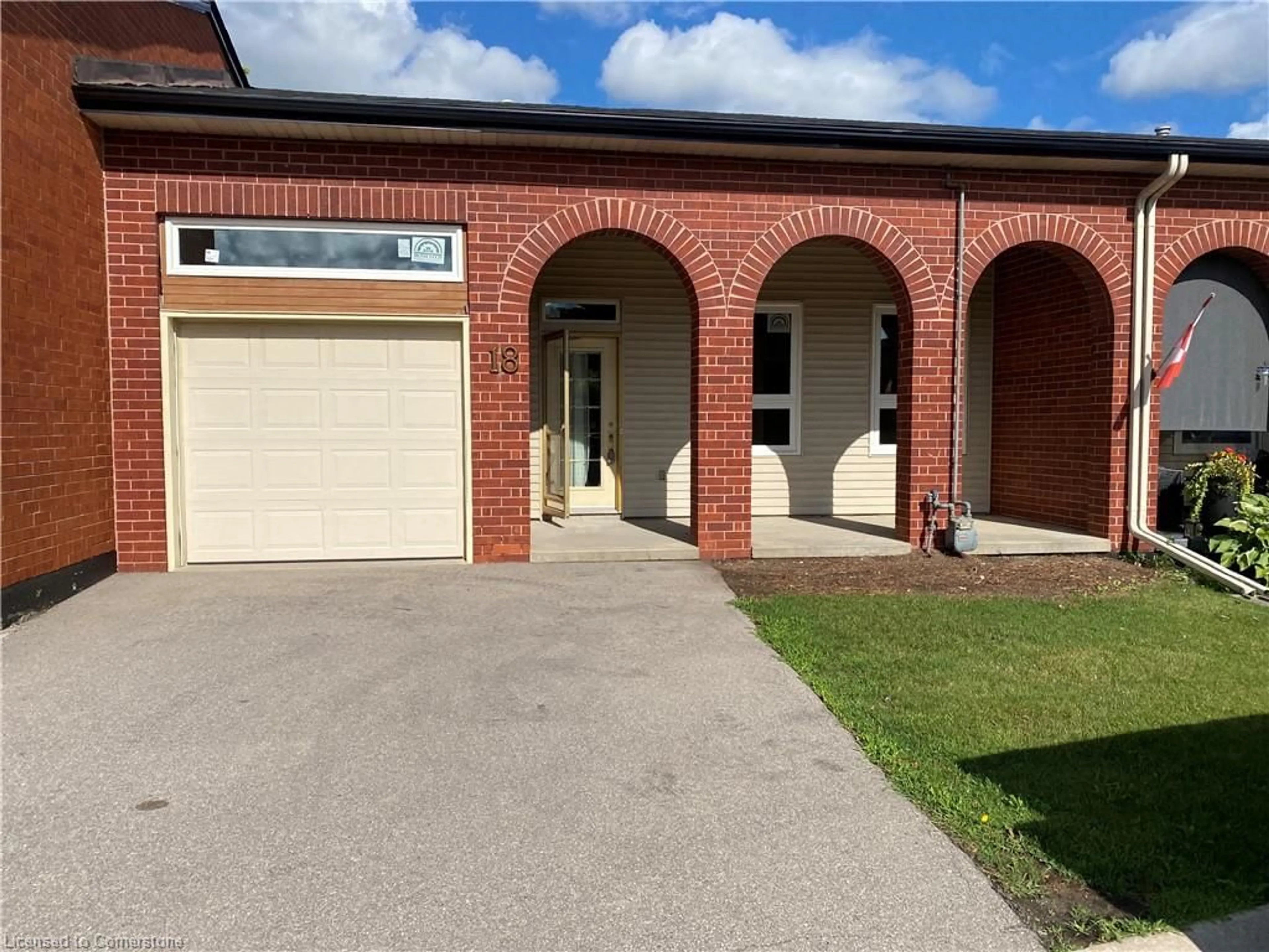 Home with brick exterior material for 18 Archdeacon Clark Trail, Hamilton Ontario L9B 2M2