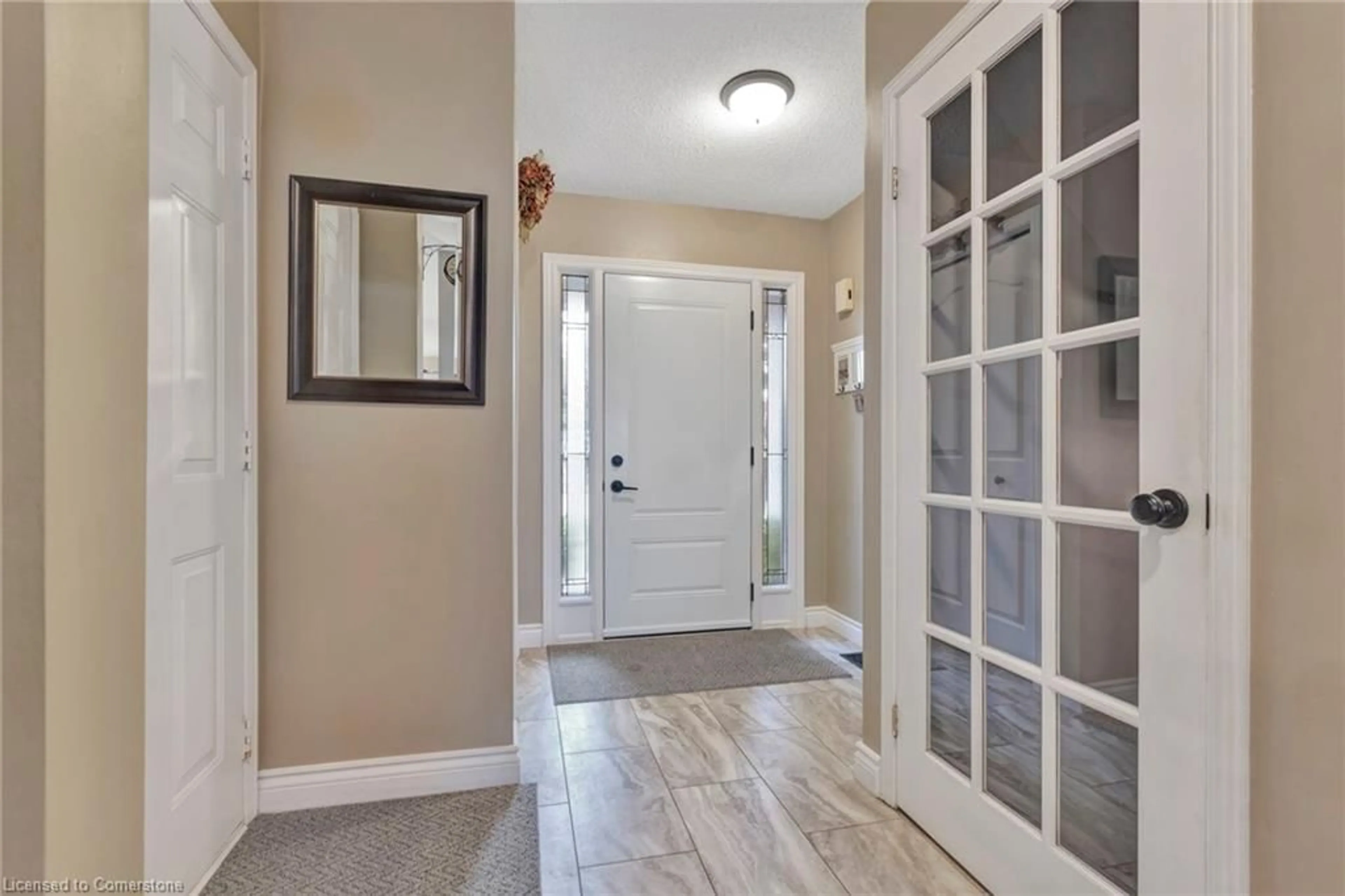 Indoor entryway, wood floors for 30 Philomena Dr, Hamilton Ontario L9B 2K2