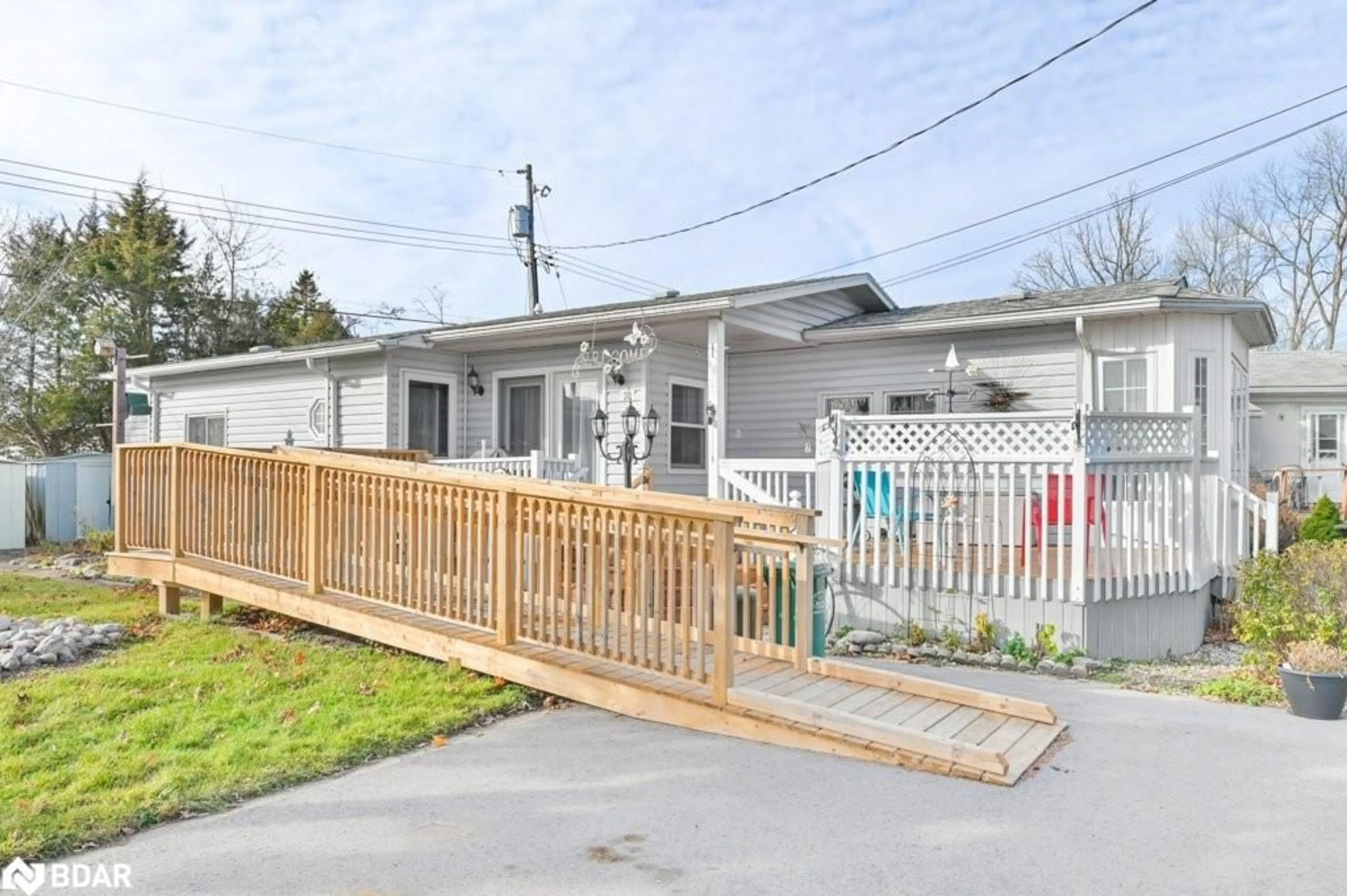 Frontside or backside of a home, the fenced backyard for 30 Kenneth Blvd, Quinte West Ontario K8N 4Z3