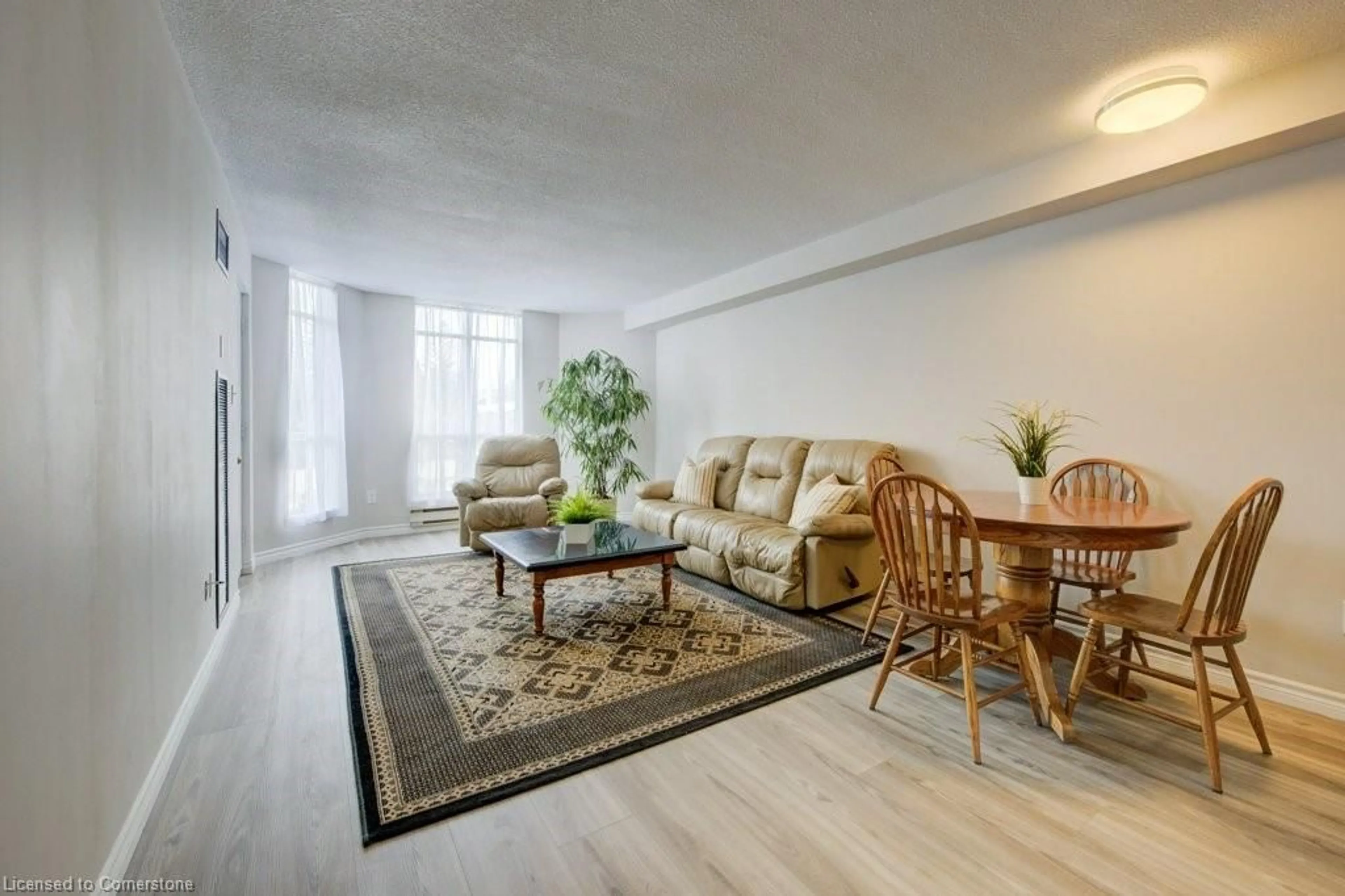 Living room, wood floors for 1414 King St #202, Kitchener Ontario N2G 4T8