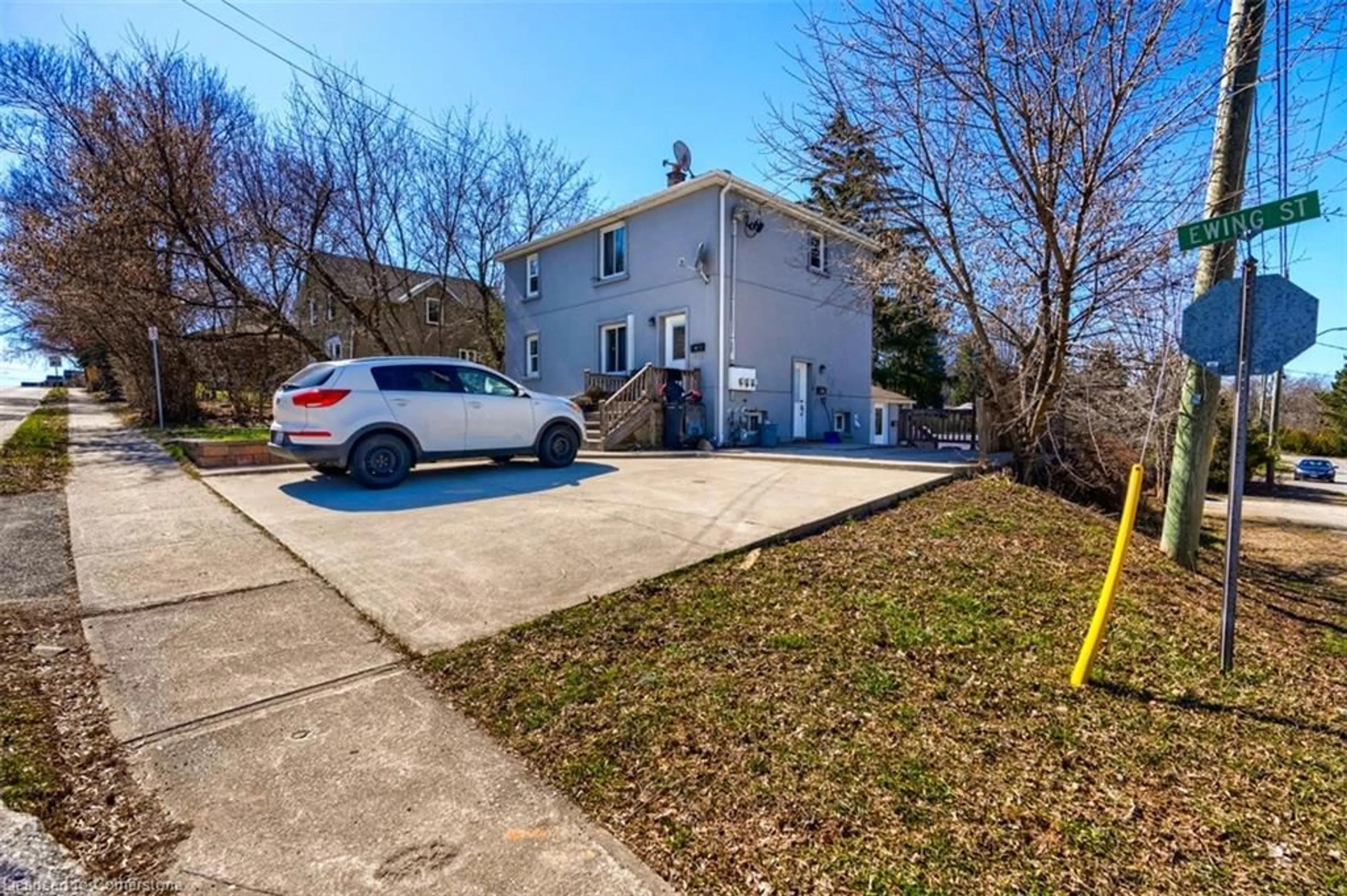 A pic from exterior of the house or condo, the street view for 18 Ewing St, Georgetown Ontario L7G 2P7