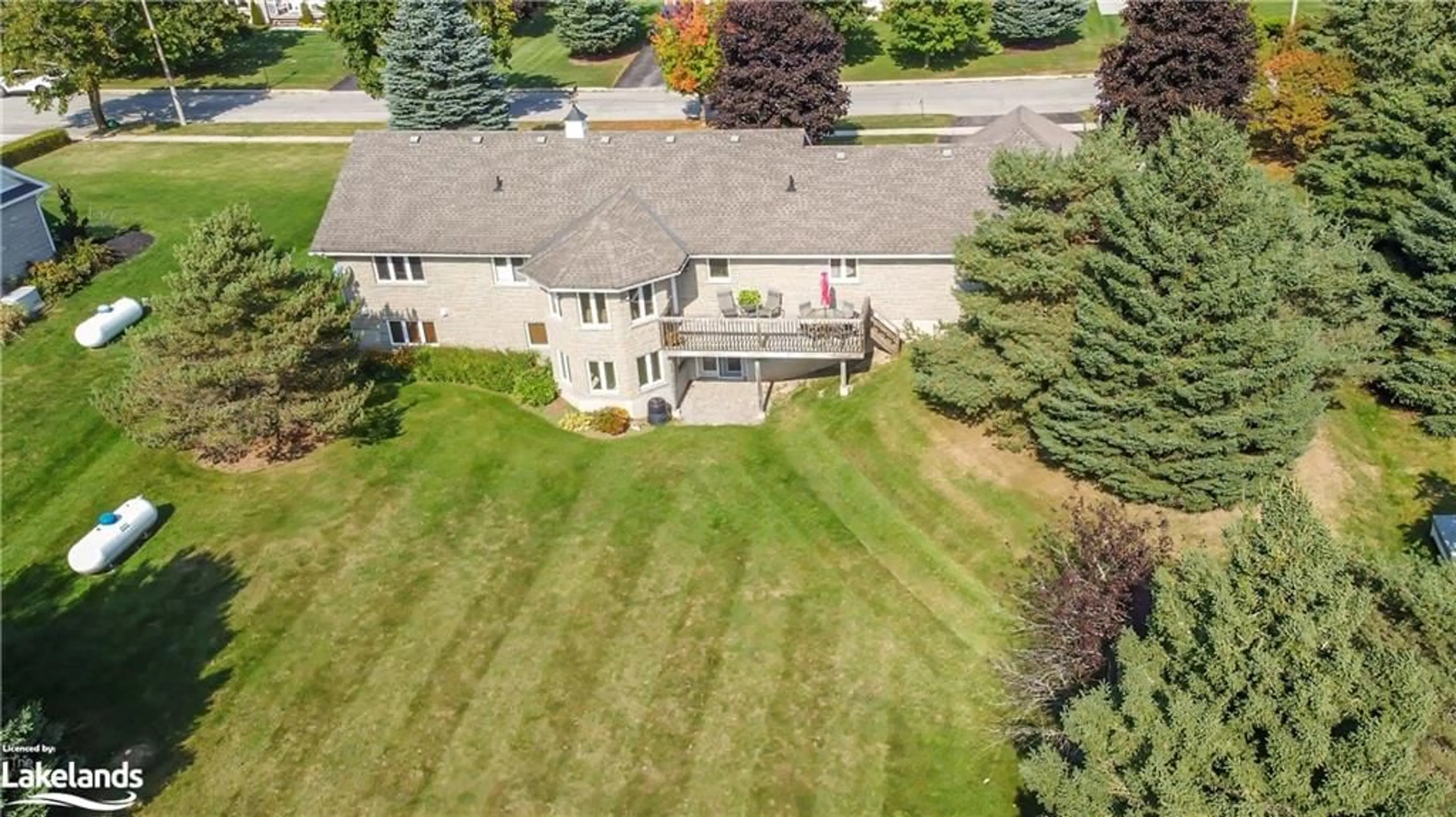 Frontside or backside of a home, the fenced backyard for 101 Conservation Trail, Centre Wellington Ontario N0B 1J0