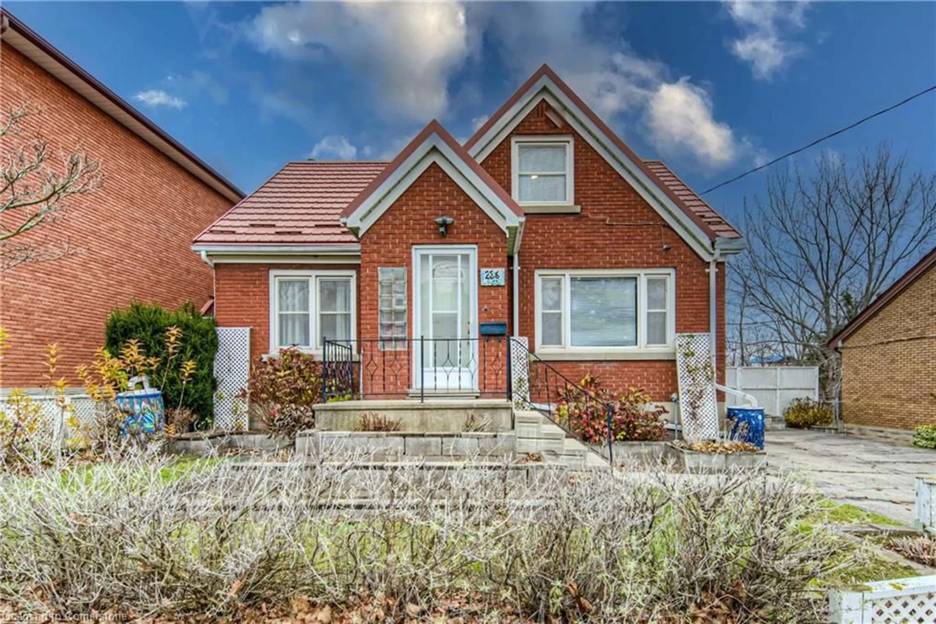 Home with brick exterior material for 236 Guelph St, Kitchener Ontario N2H 5X1