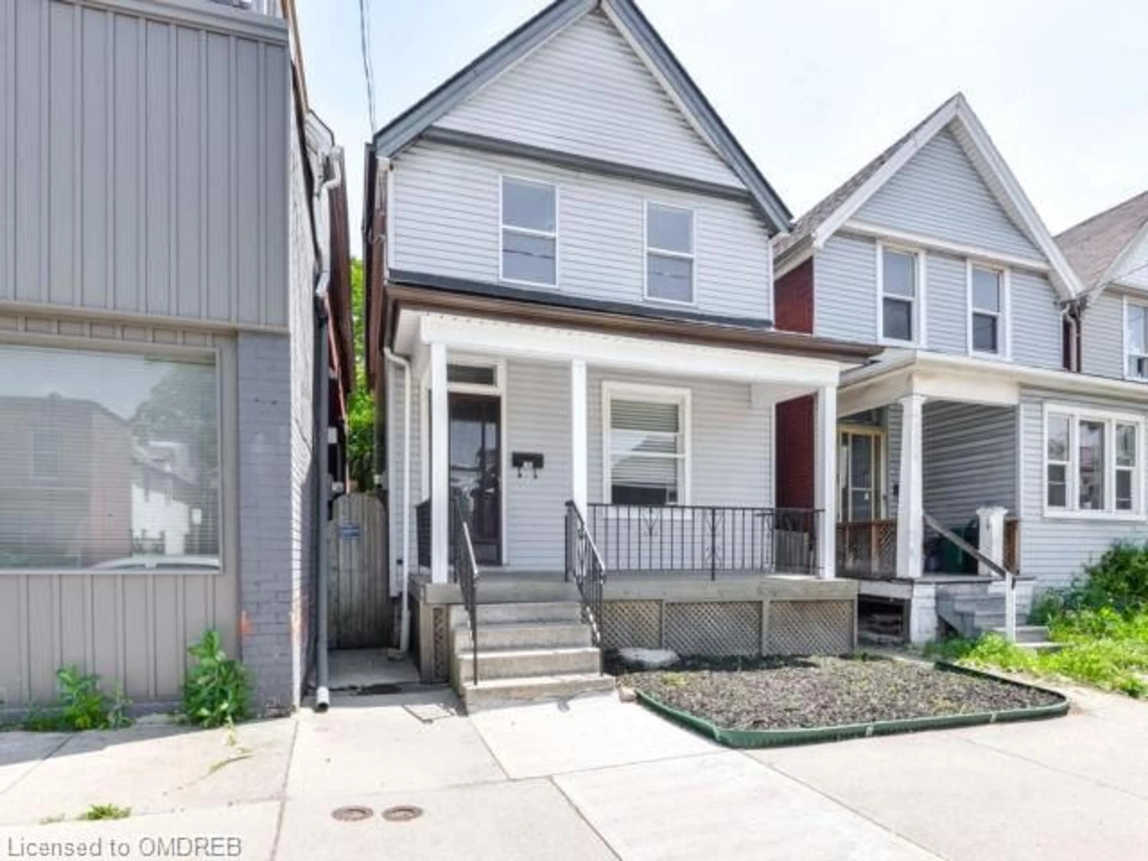 Frontside or backside of a home, the street view for 186 Sherman Ave, Hamilton Ontario L8L 6M9