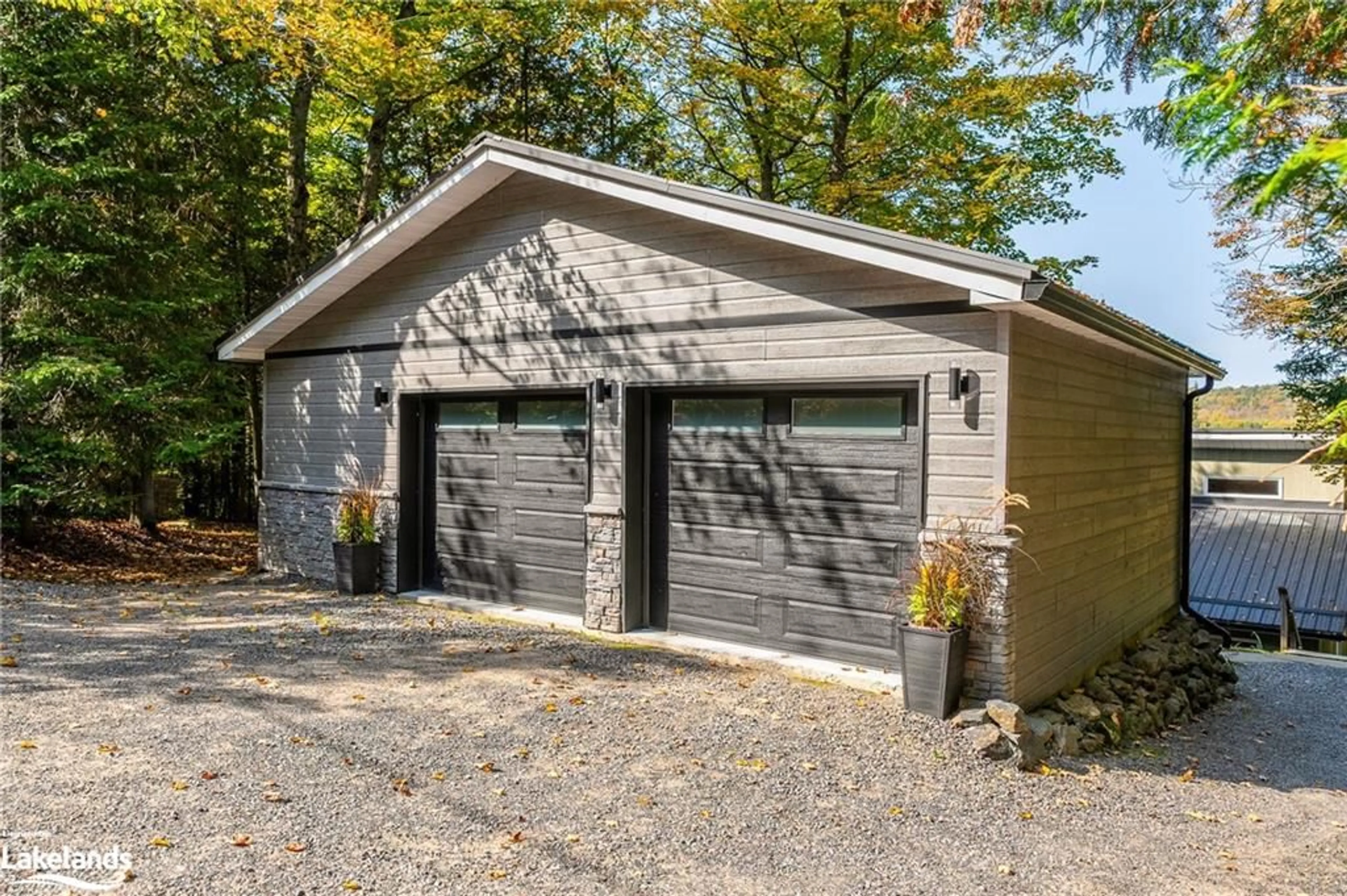 Indoor garage, wood floors for 293 West Diamond Lake Rd, Highland Grove Ontario K0L 2A0