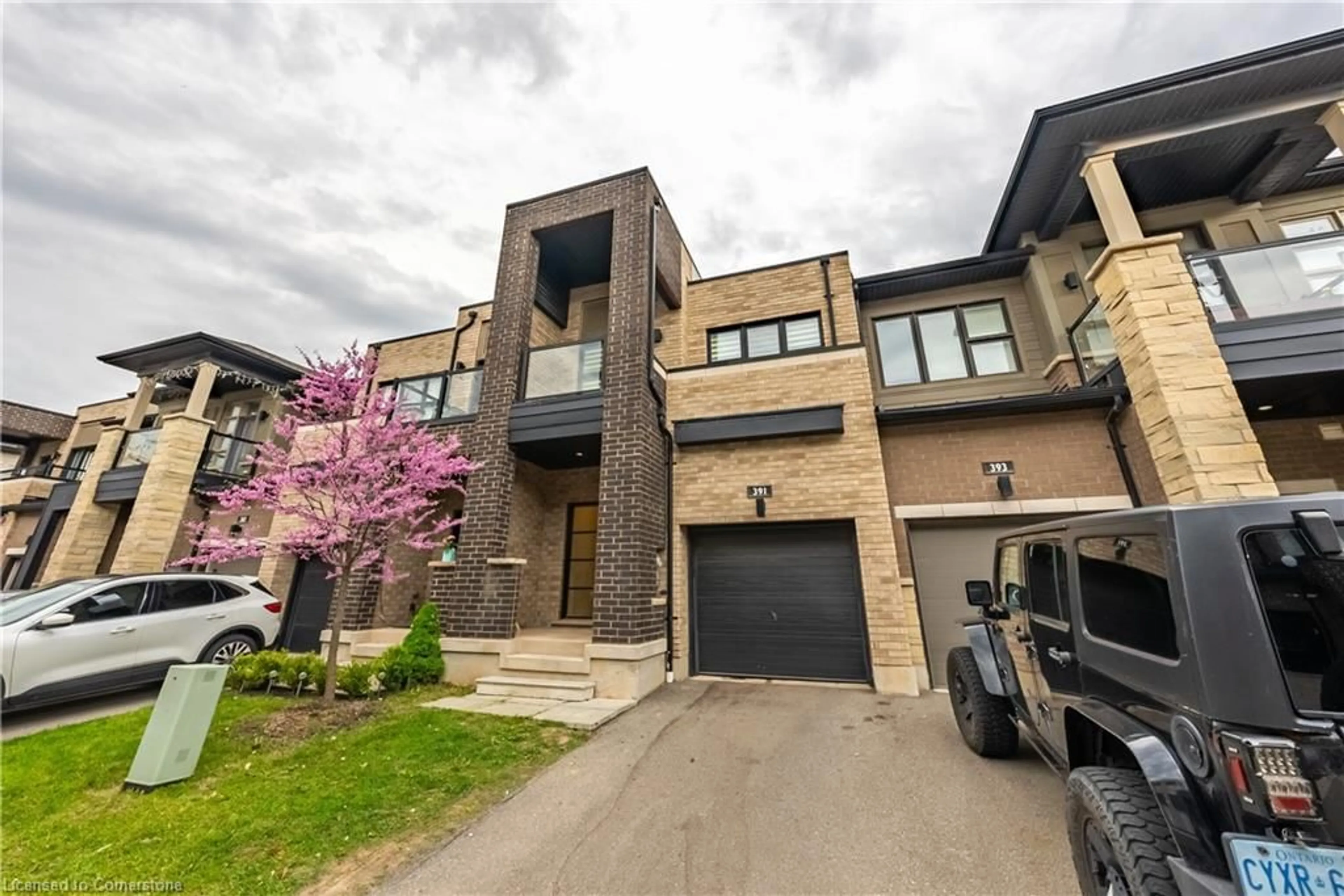 A pic from exterior of the house or condo, the street view for 391 Athabasca Common, Oakville Ontario L6H 0R5