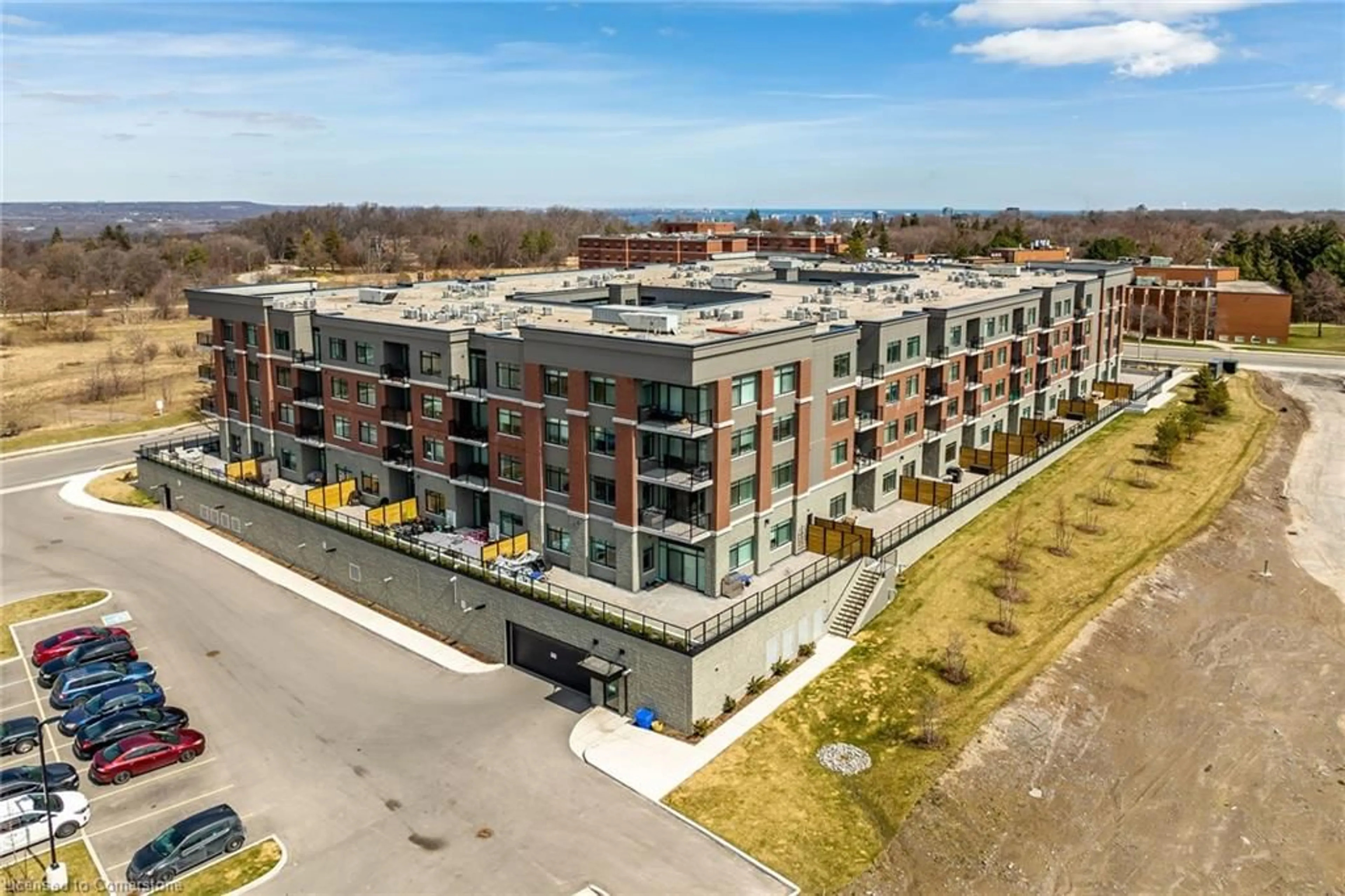 A pic from exterior of the house or condo, the front or back of building for 1 Redfern Ave #403, Hamilton Ontario L9C 7S8