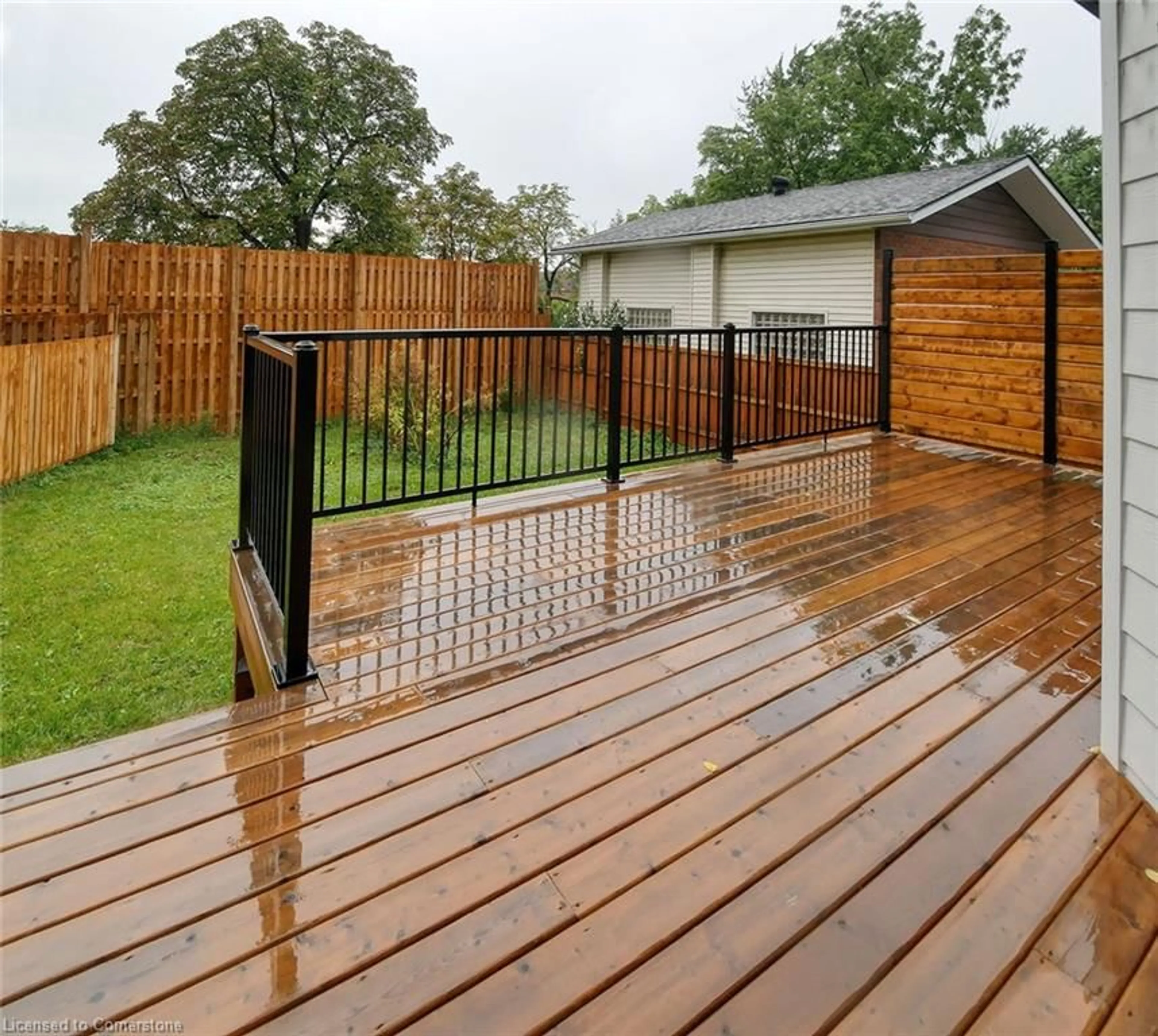 Patio, the fenced backyard for 77 Welland St, Thorold Ontario L2V 2B7