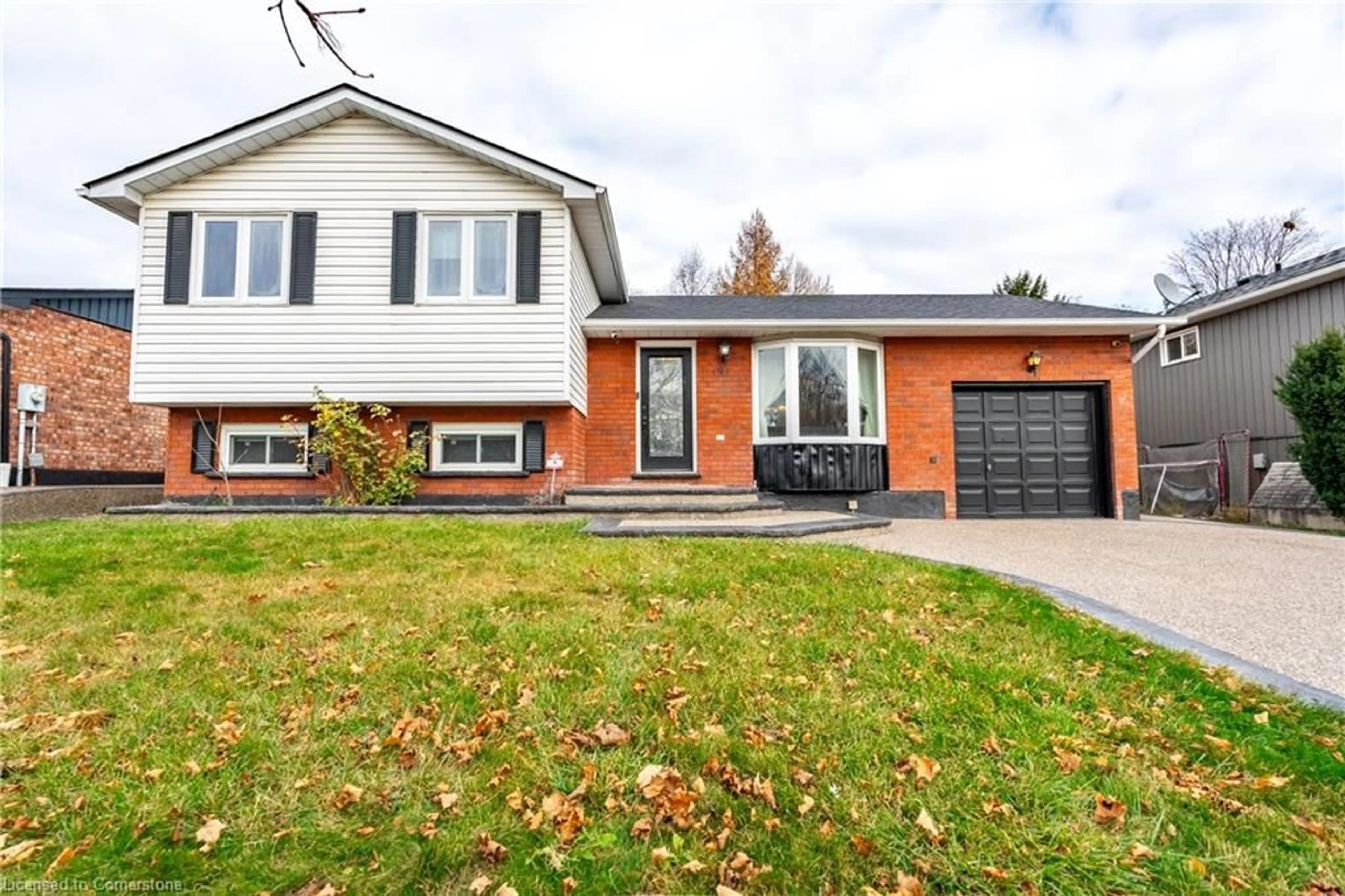 Home with brick exterior material for 191 Williamson Dr, Caledonia Ontario N3W 1A5