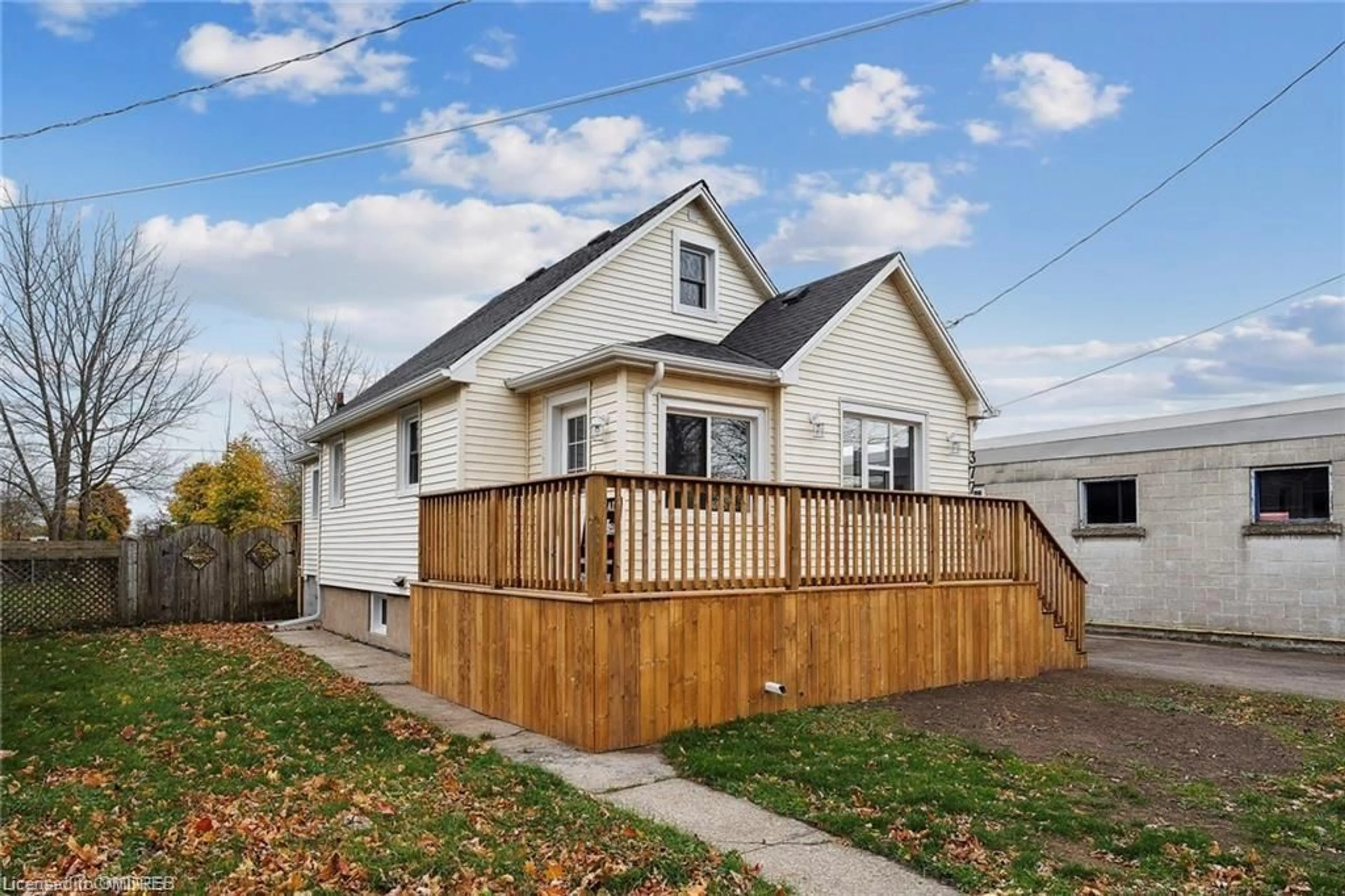 Frontside or backside of a home, the fenced backyard for 377 Davis St, Port Colborne Ontario L3K 1Z5